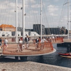People walking and biking across the Circle Bridge in Copenhagen