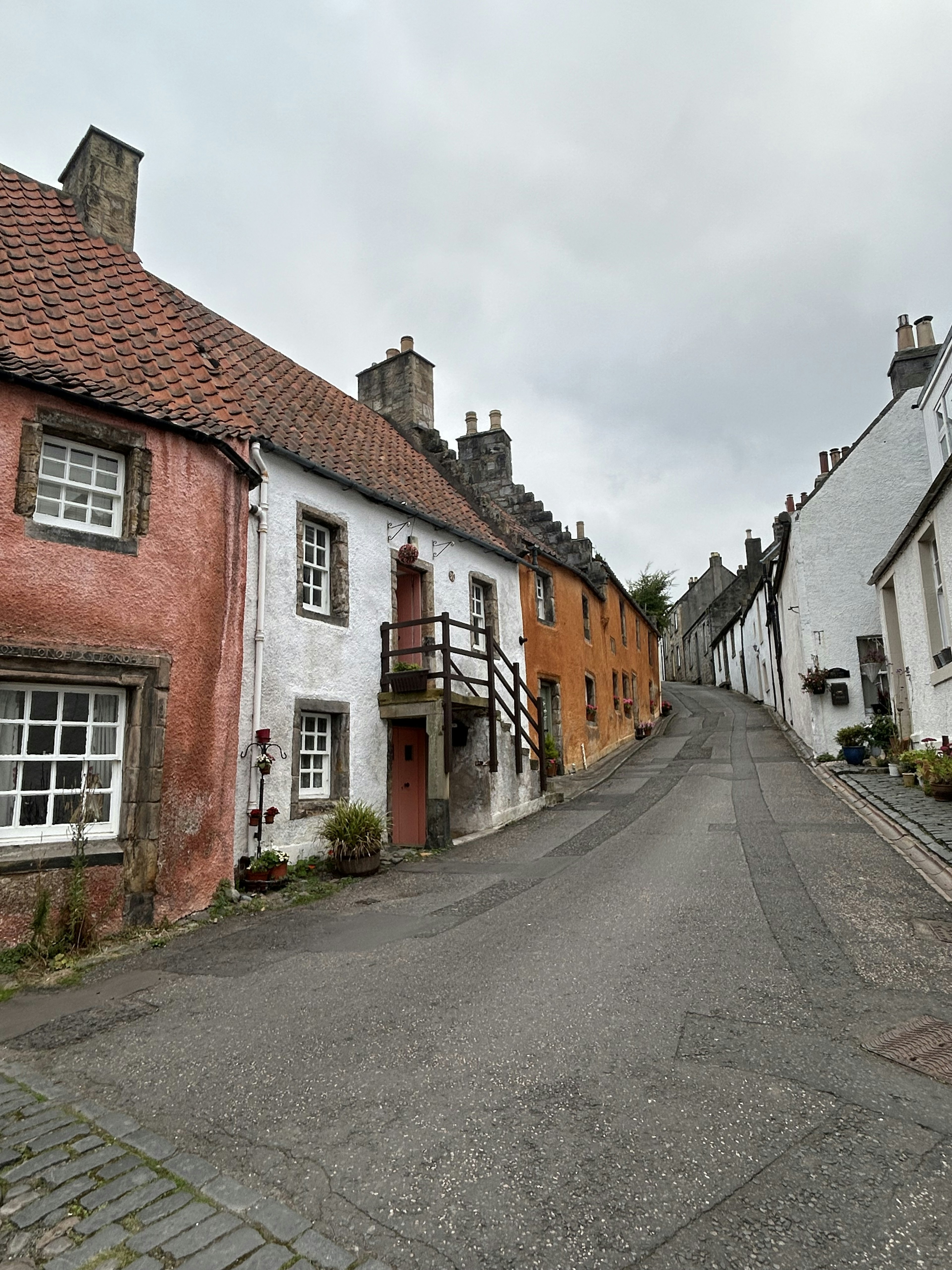 A side street with colorful houses in the village of Culross