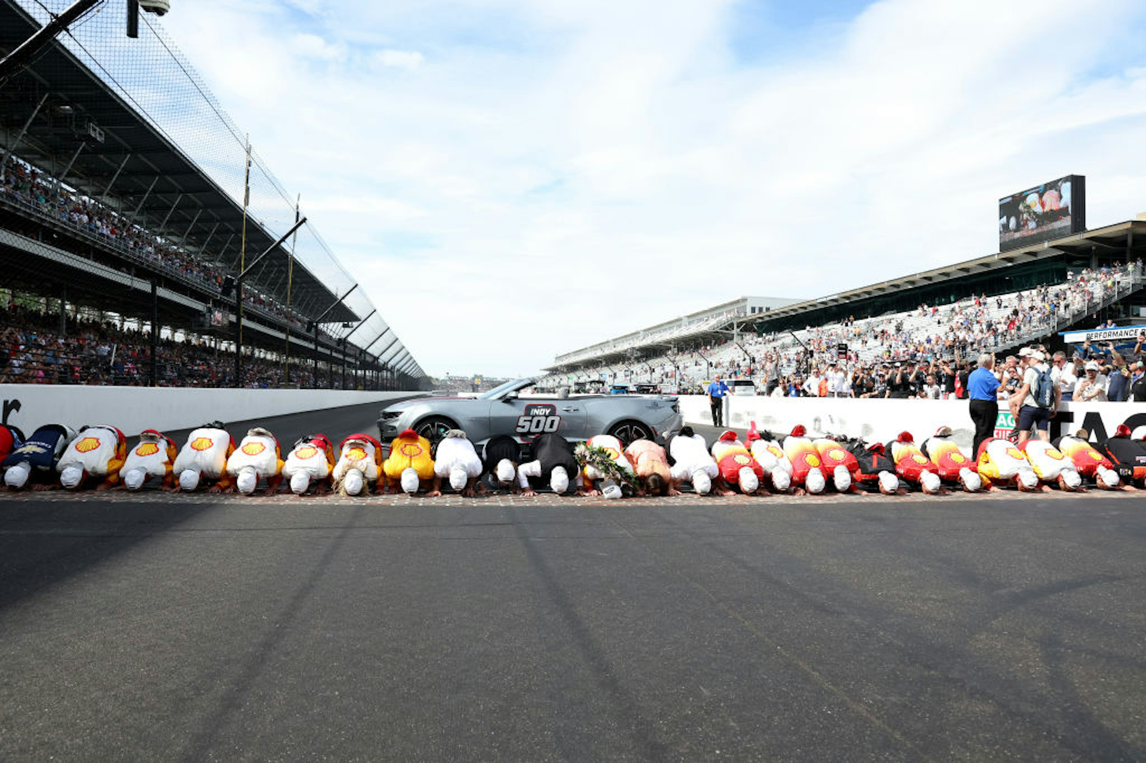 osef Newgarden, driver of the #2 PPG Team Penske Chevrolet, kisses the bricks after winning The 107th Running of the Indianapolis 500 at Indianapolis Motor Speedway on May 28, 2023 in Indianapolis, Indiana.