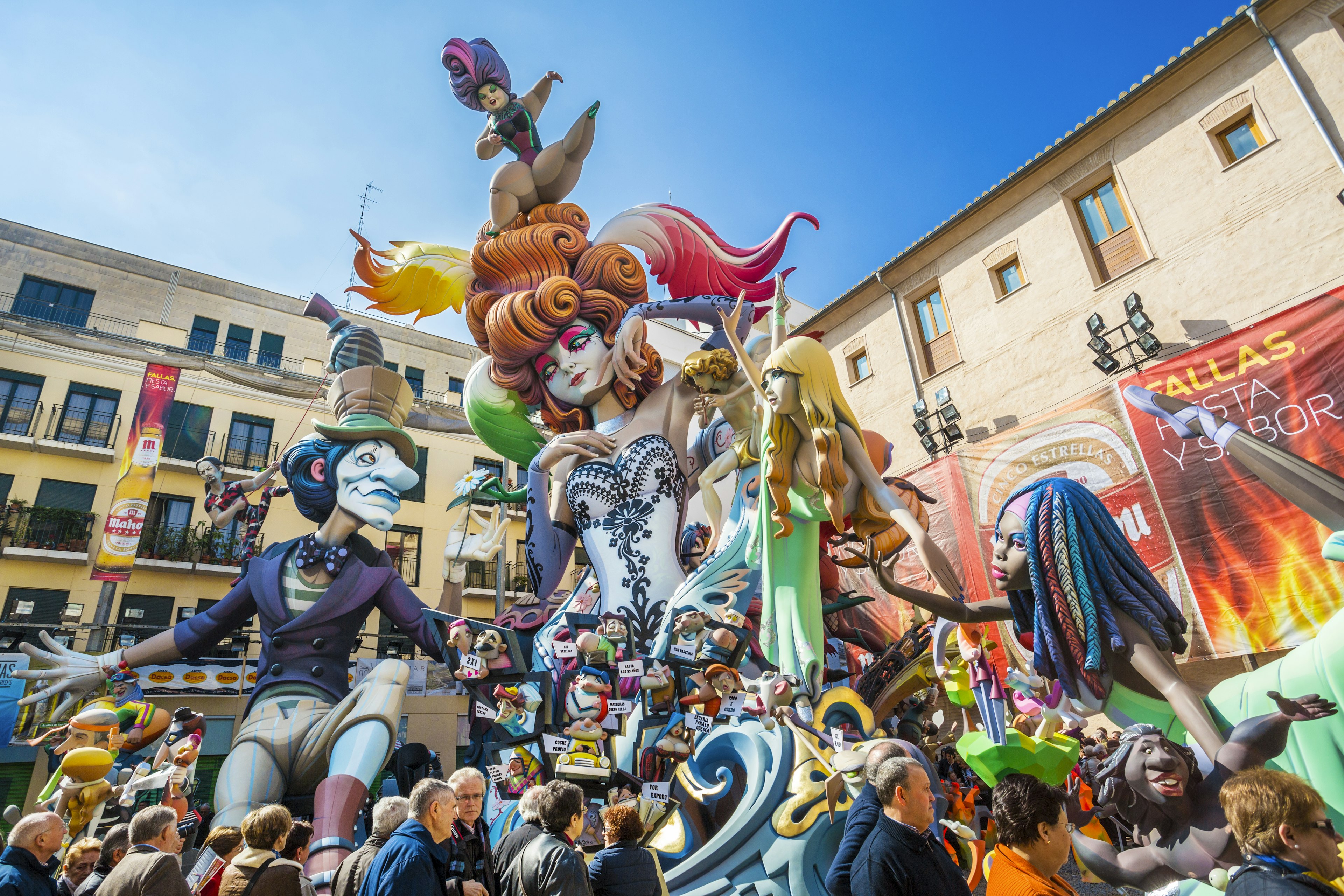 Large colorful sculptures line the streets as part of a festival