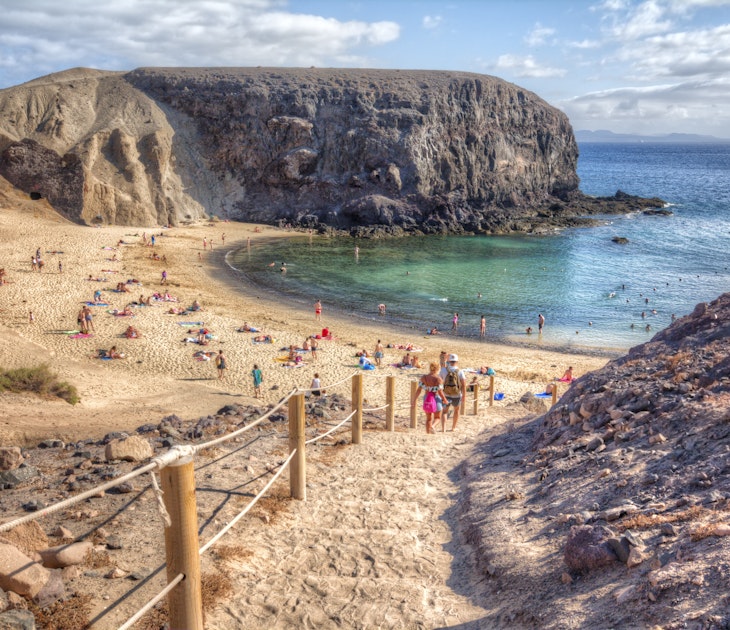One of the beaches on the southern tip of the island of Lanzarote is Playa Papagayo. The volcanic landscape favors this small and beautiful cove sheltered from the humid Canary climate.