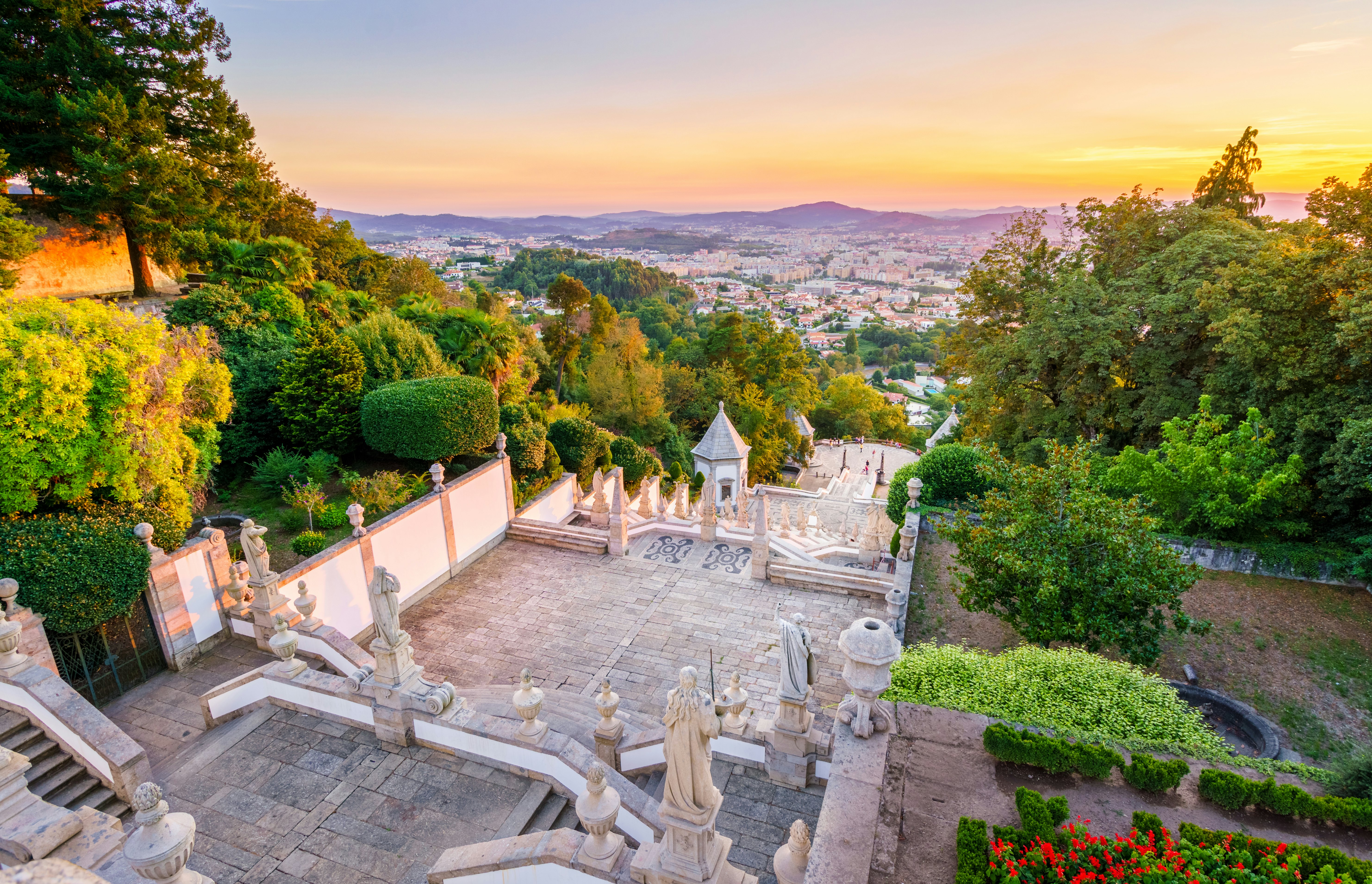 The Bom Jesus do Monte Sanctuary is located in the city of Braga, Portugal at sunset. It is one of the iconic location of Portugal,  with a long and beautiful stairways leading to the doors of the cathedral.