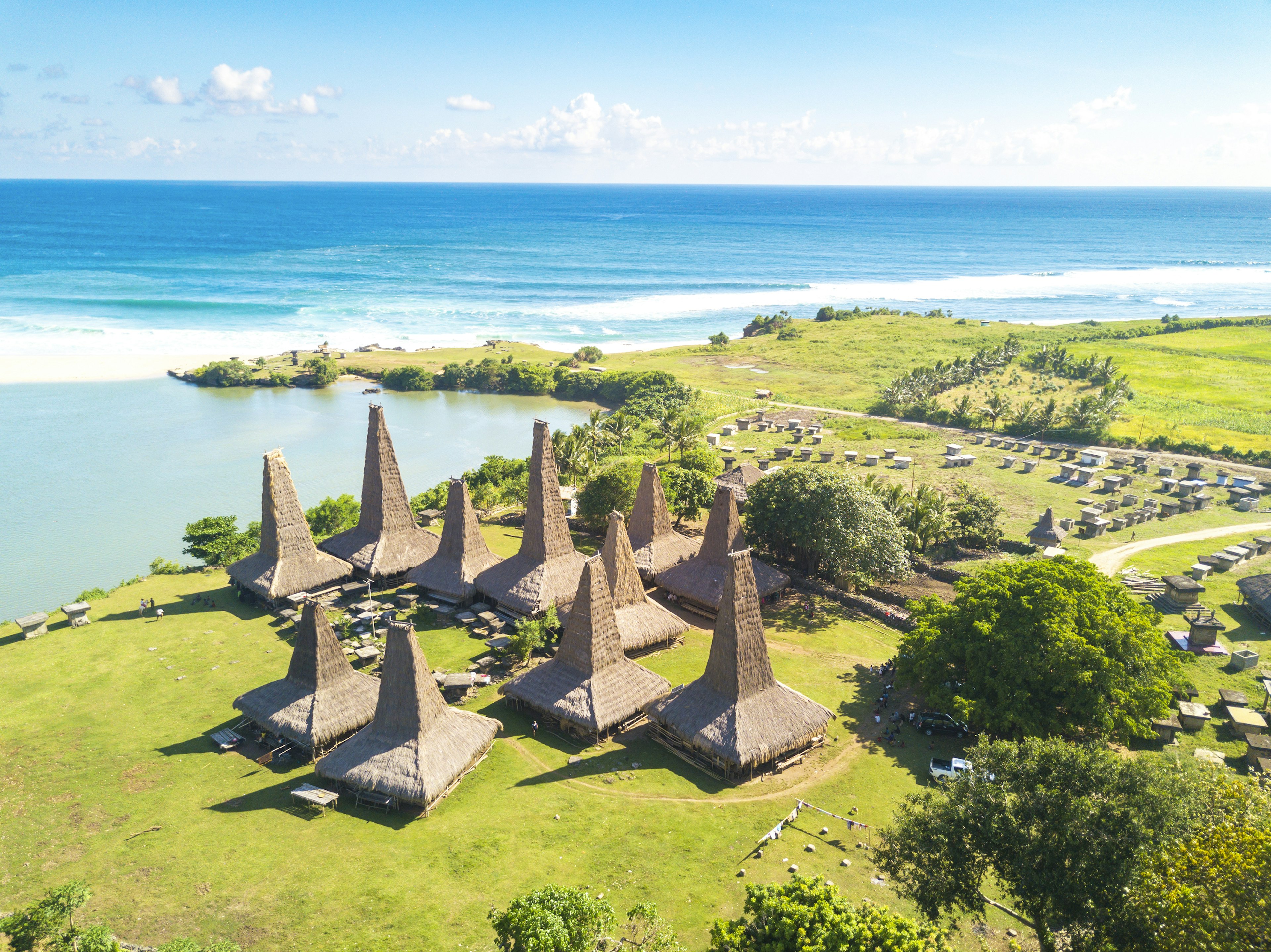 Aerial of the Kampung Adat Ratenggaro traditional village on the Western coast of Sumba.