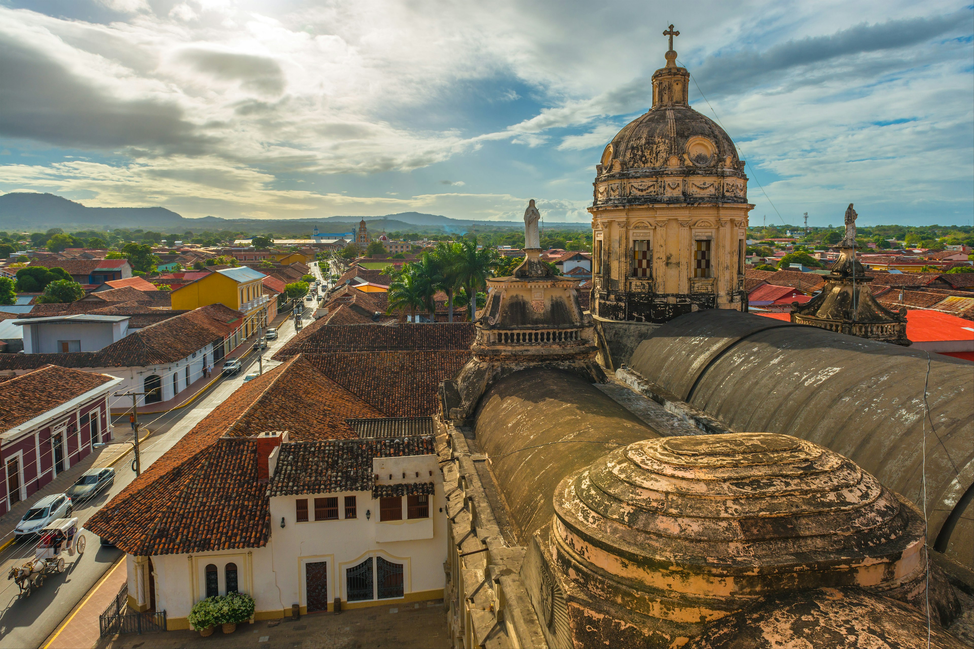 Skyline of Granada City at sunset with a view over the Merced church.