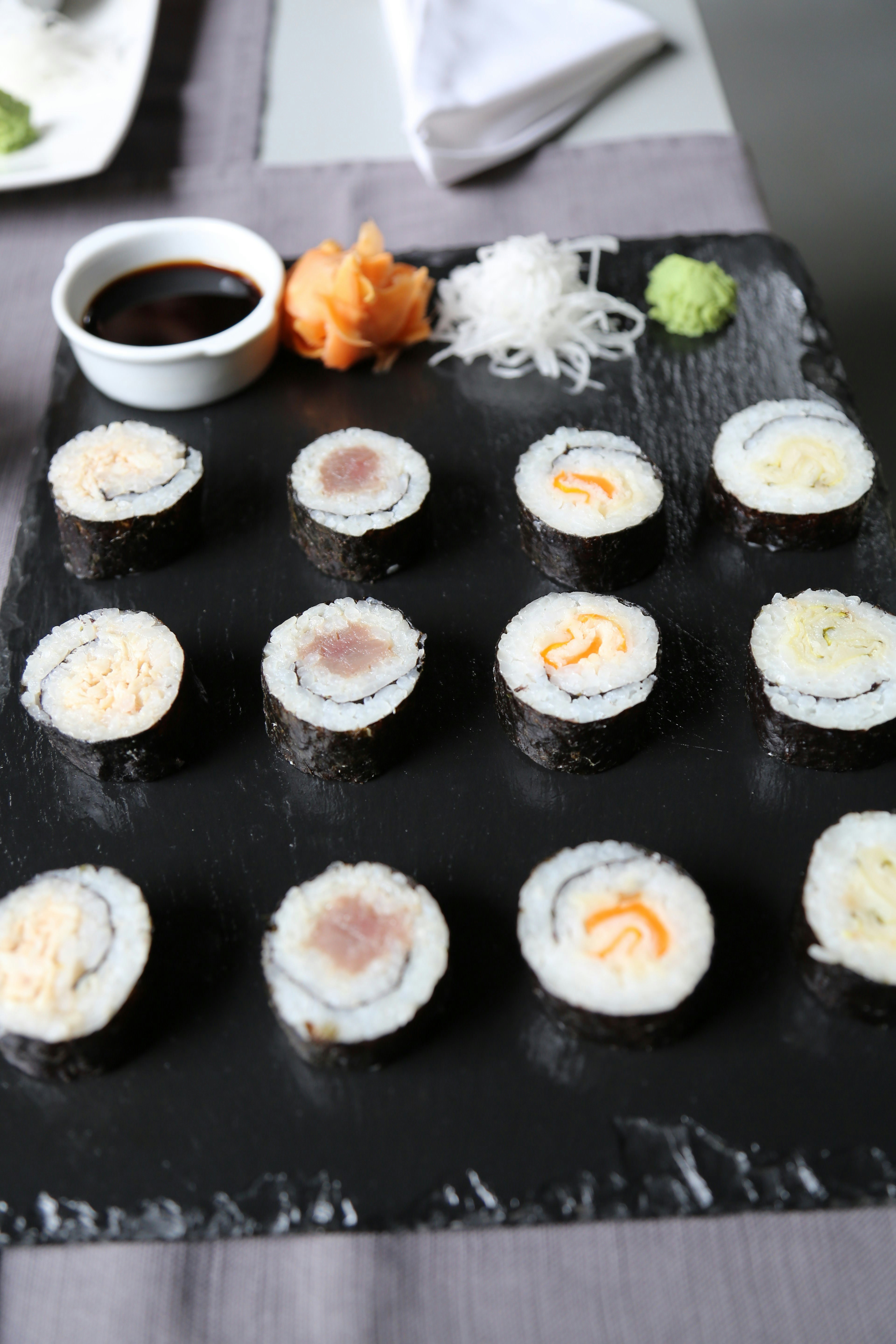 A plate of Japanese sushi served at a restaurant.