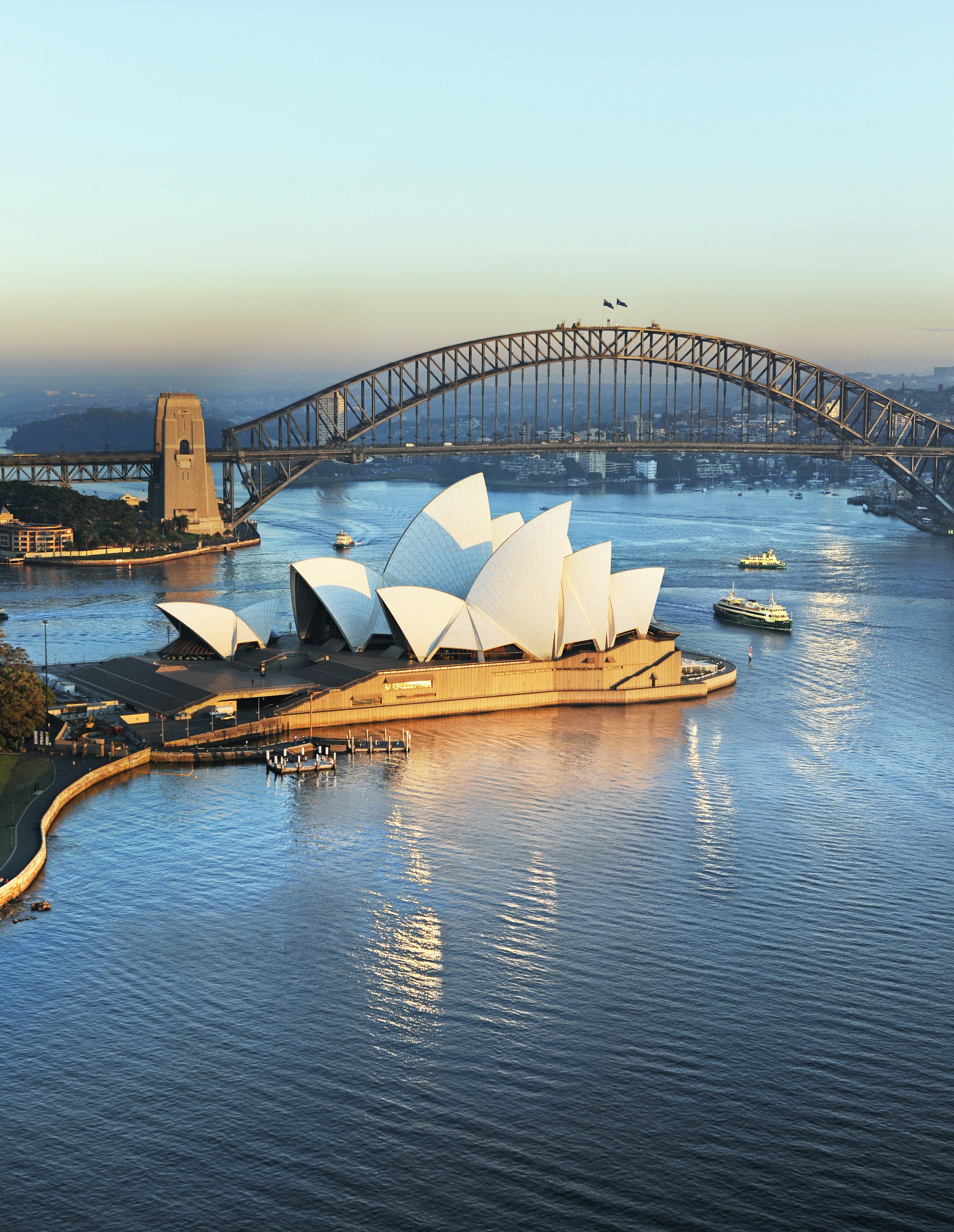 Aerial view of Sydney Opera House and Harbour Bridge.