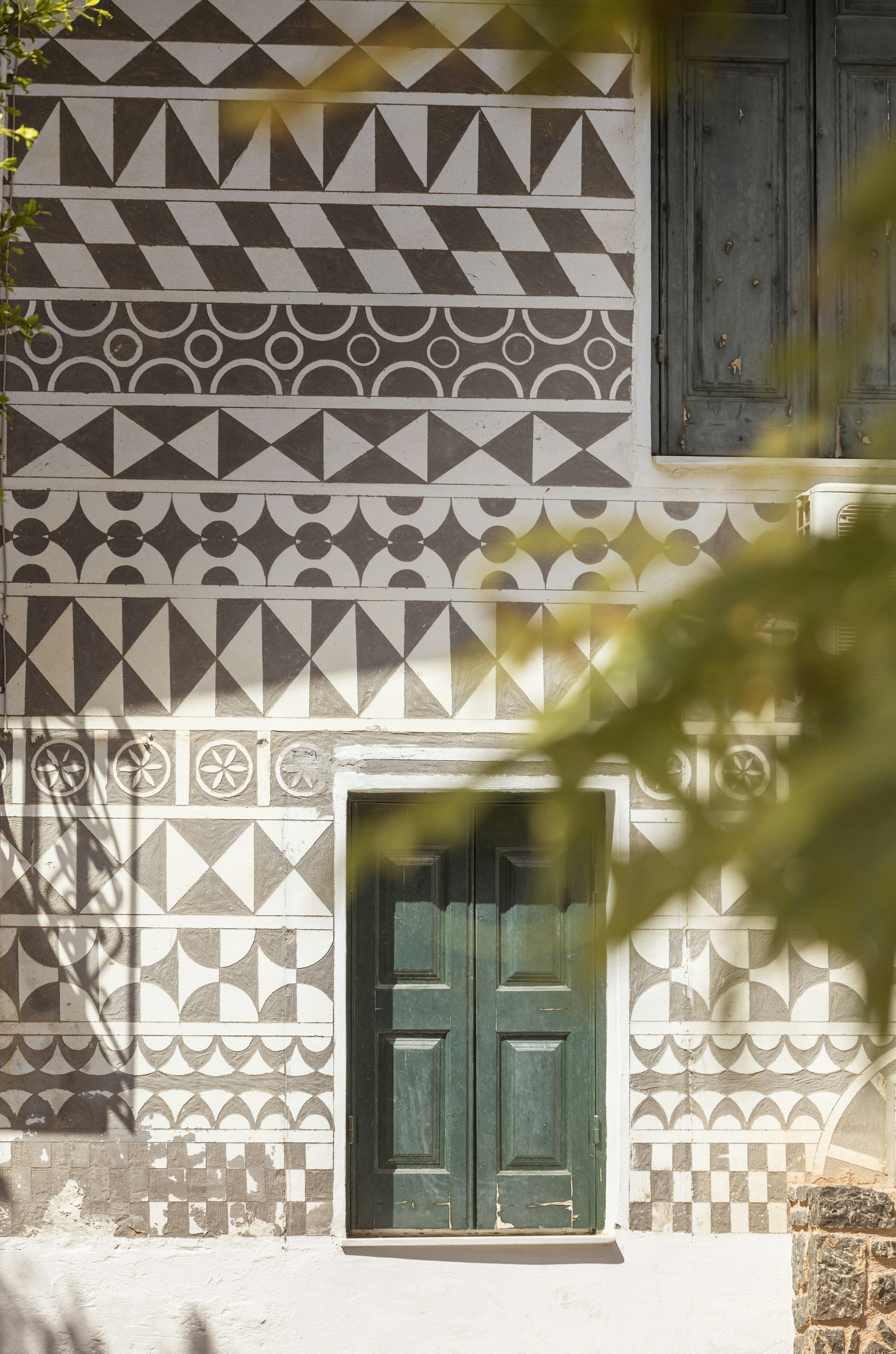 Pyrgi’s distinctive geometric decoration on a facade.