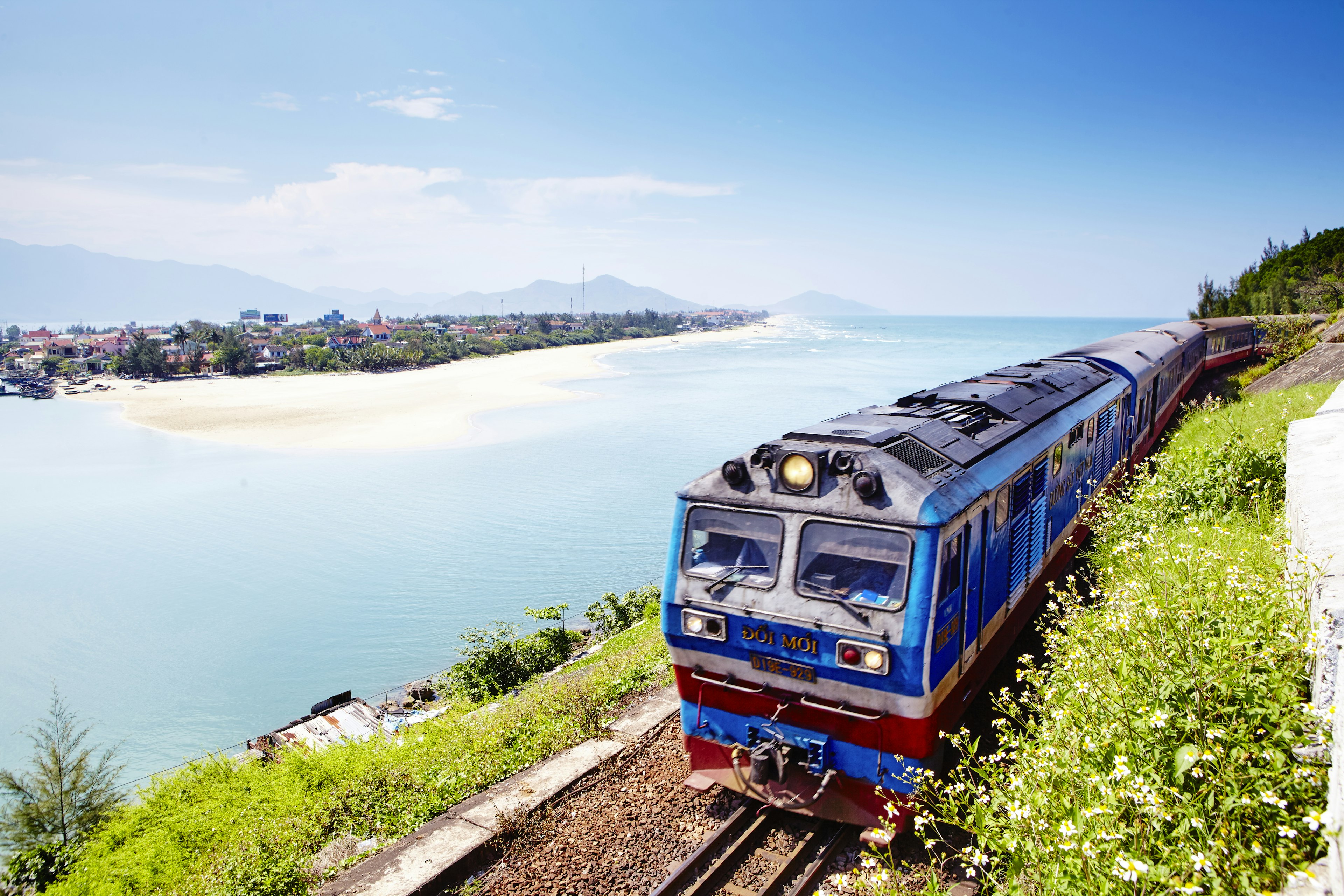 The Reunification Express makes its way passed the beach town of Lang Co.