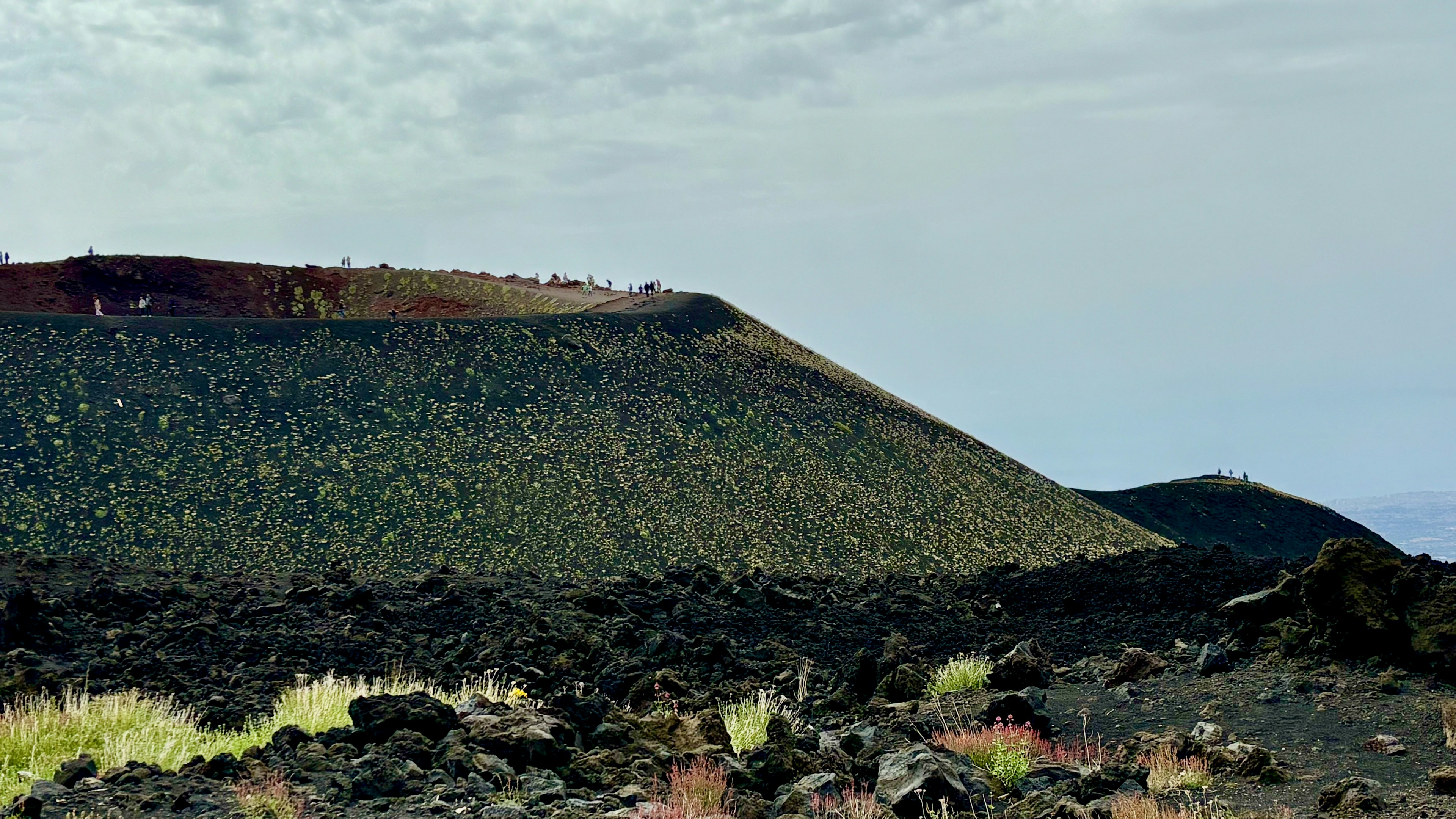 Families walking around extinct Silvestri Crater.