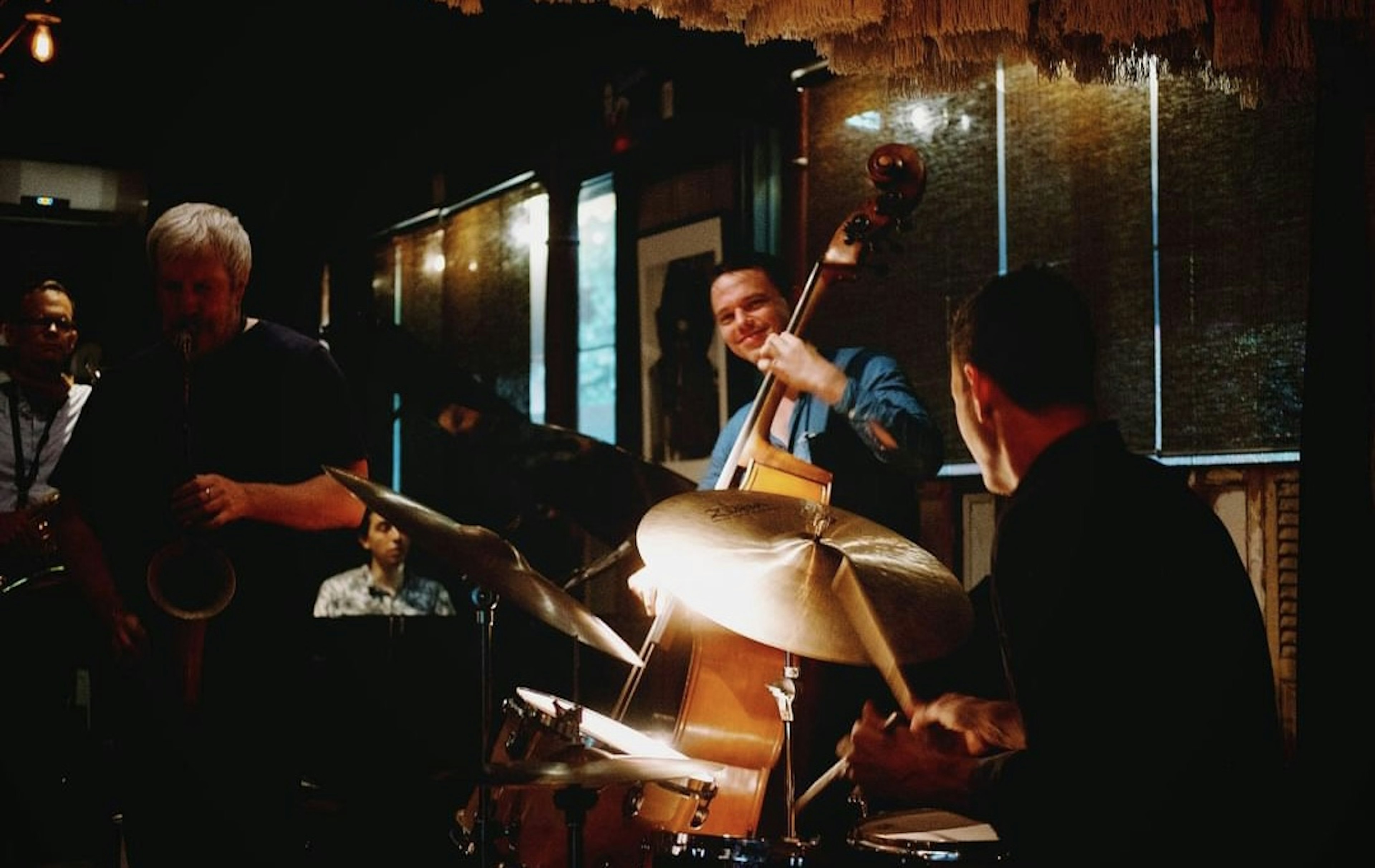 Jazz musicians performing in a bar