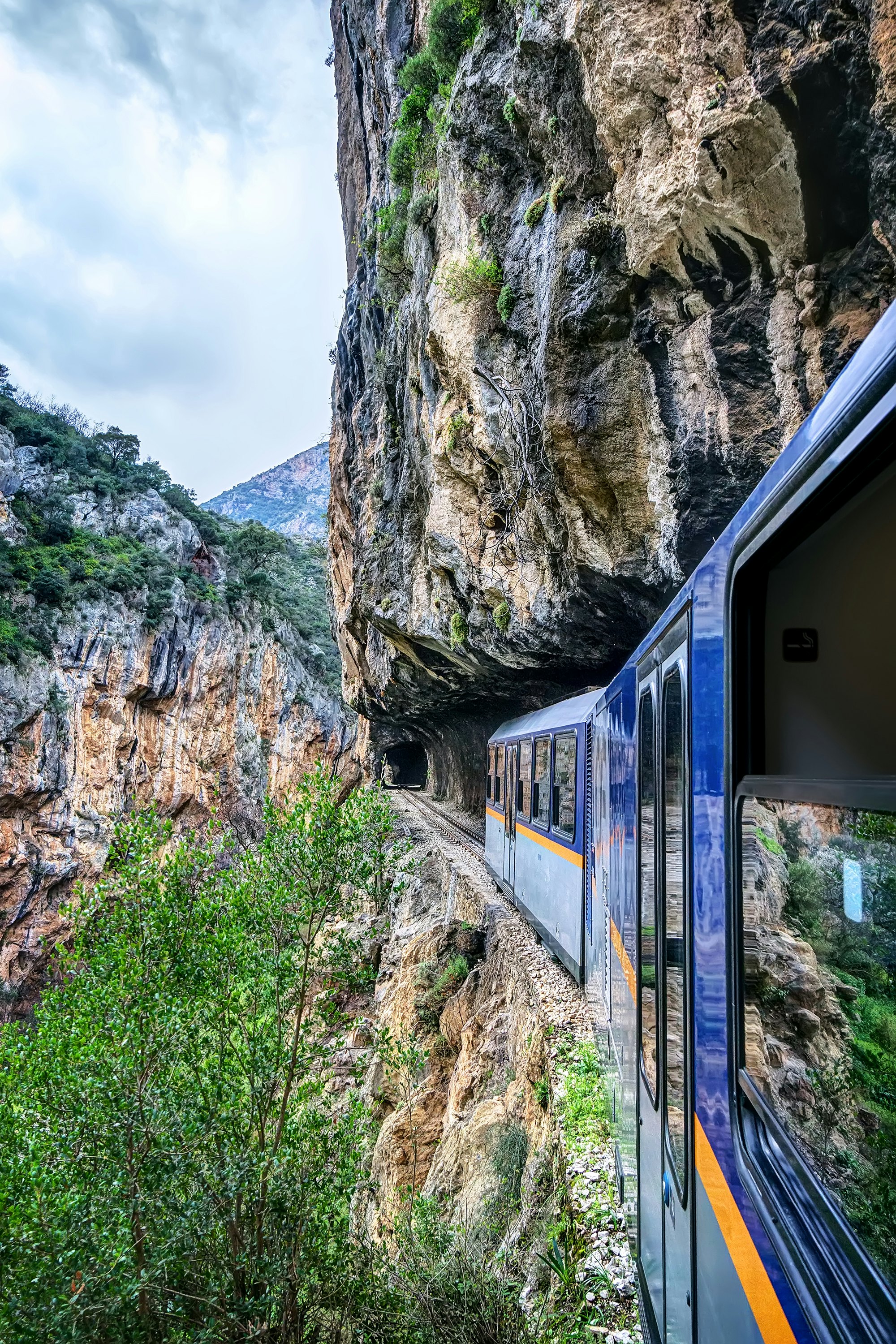 Odontotos rack railway Diakopto – Kalavrita in Vouraikos gorge, with tracks dug on rocky cliffs.