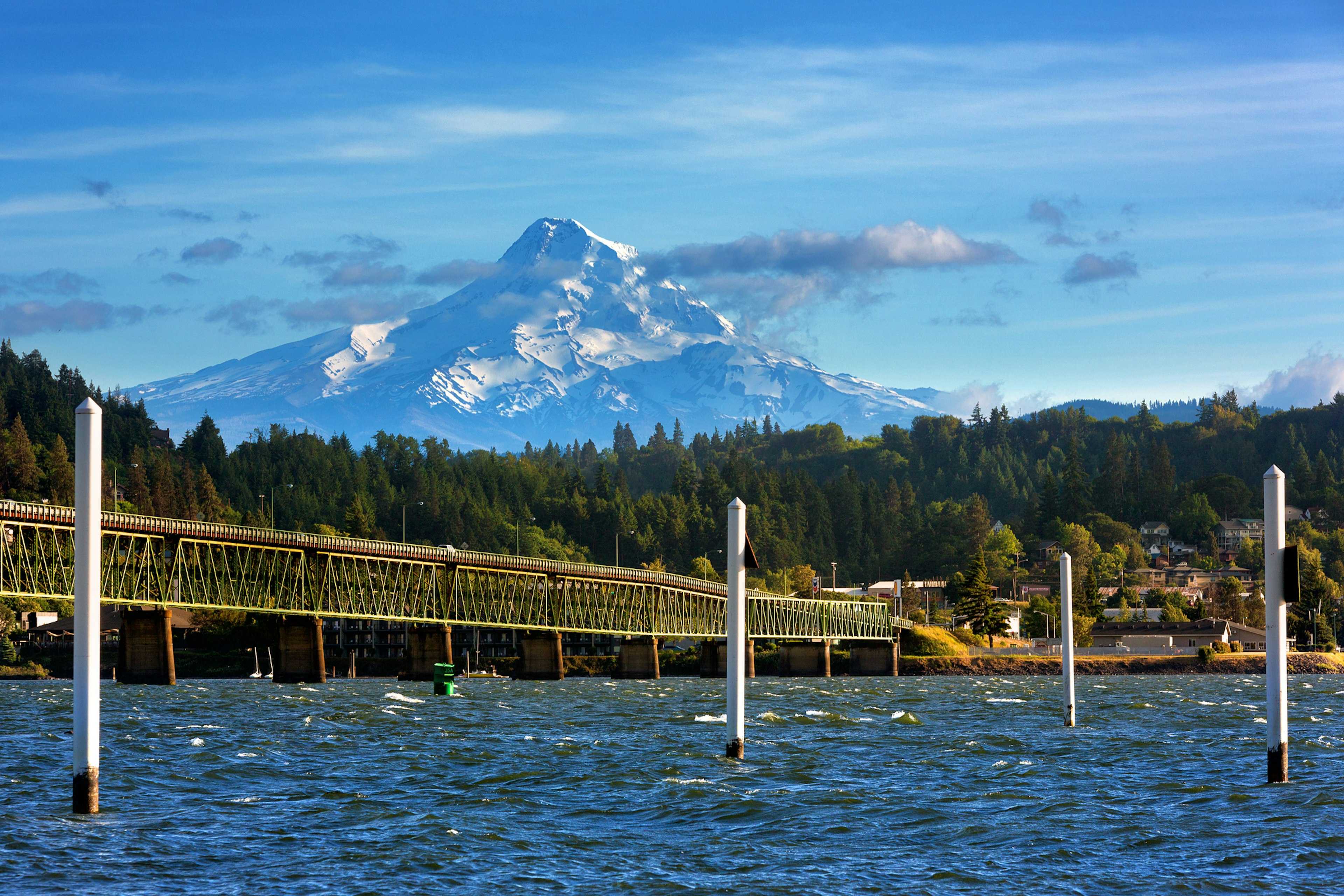 Mount Hood rises dramatically over the Hood River in Oregon. Anna Gorin/Getty Images