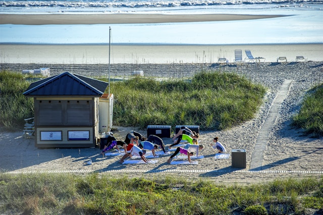 From quiet beach walks to surf-side yoga sessions, you can escape it all on Kiawah Island. Judd Brotman/Getty Images