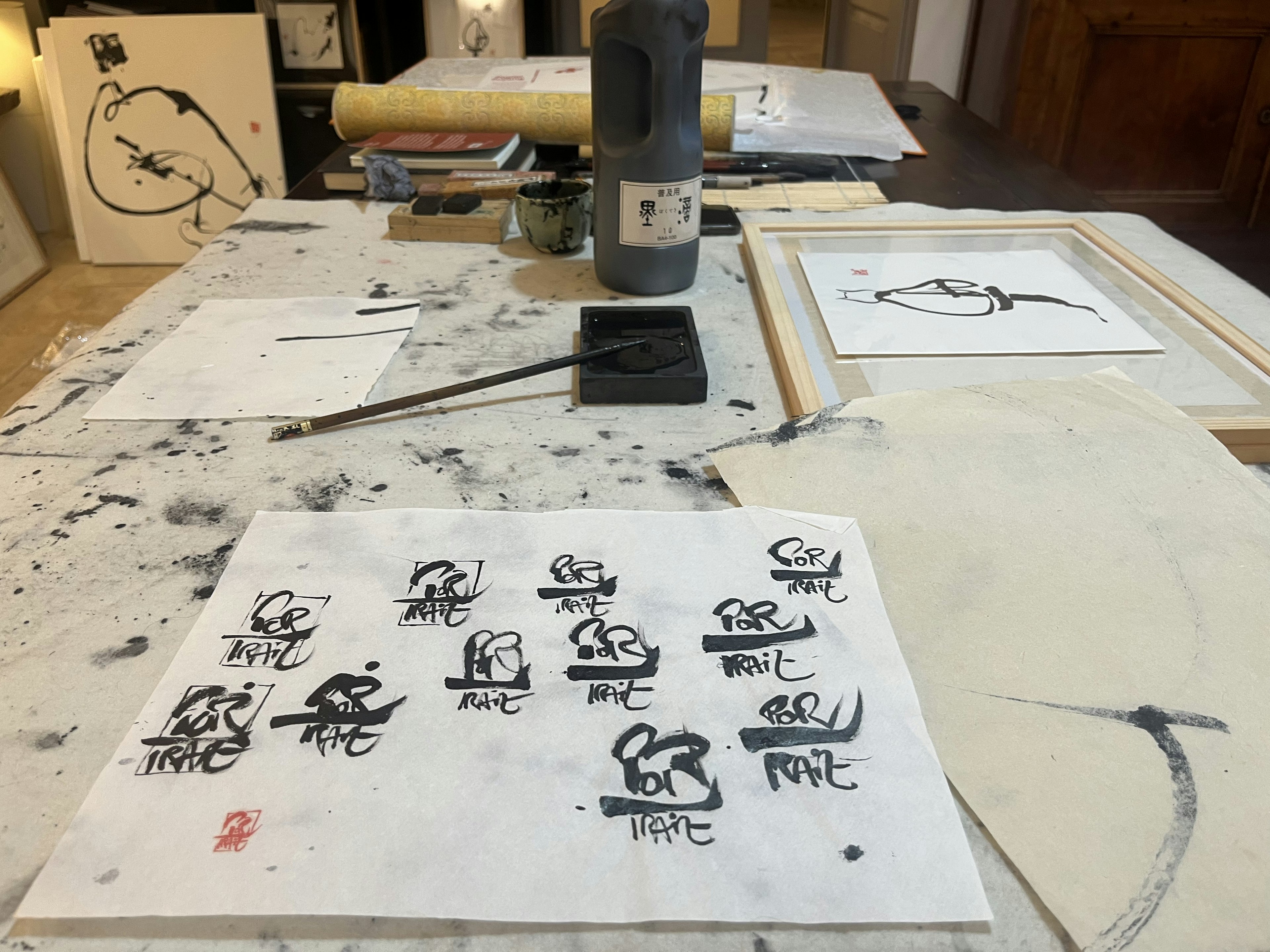 Examples of calligraphy practise by the journalist on a trip to Beaujolais, France