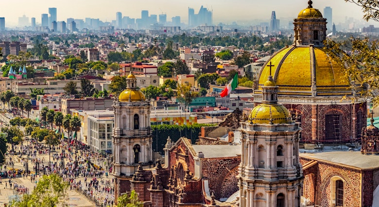 Mexico. Basilica of Our Lady of Guadalupe. Cupolas of the old basilica and cityscape of Mexico City on the far
1005708952
architectural detail, architecture, basilica, basilica of guadalupe, basilica of our lady of guadalupe, bell tower, building, church, city, cityscape, cupola, dome, facade, guadalupe, landmark, landscape, marian pontifical shrine, mexico, mexico city, monument, national shrine of mexico, pilgrim, roman catholic, sanctuary, shrine, skyline, tourist destination, tower, travel destination, urban, virgin of guadalupe