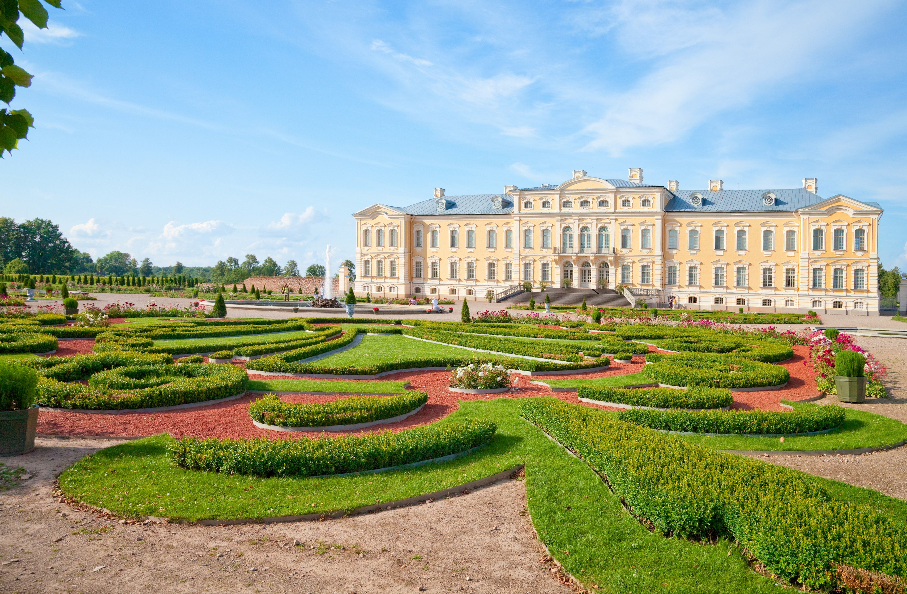 Rundale palace, with a sprawling hedge garden in front.