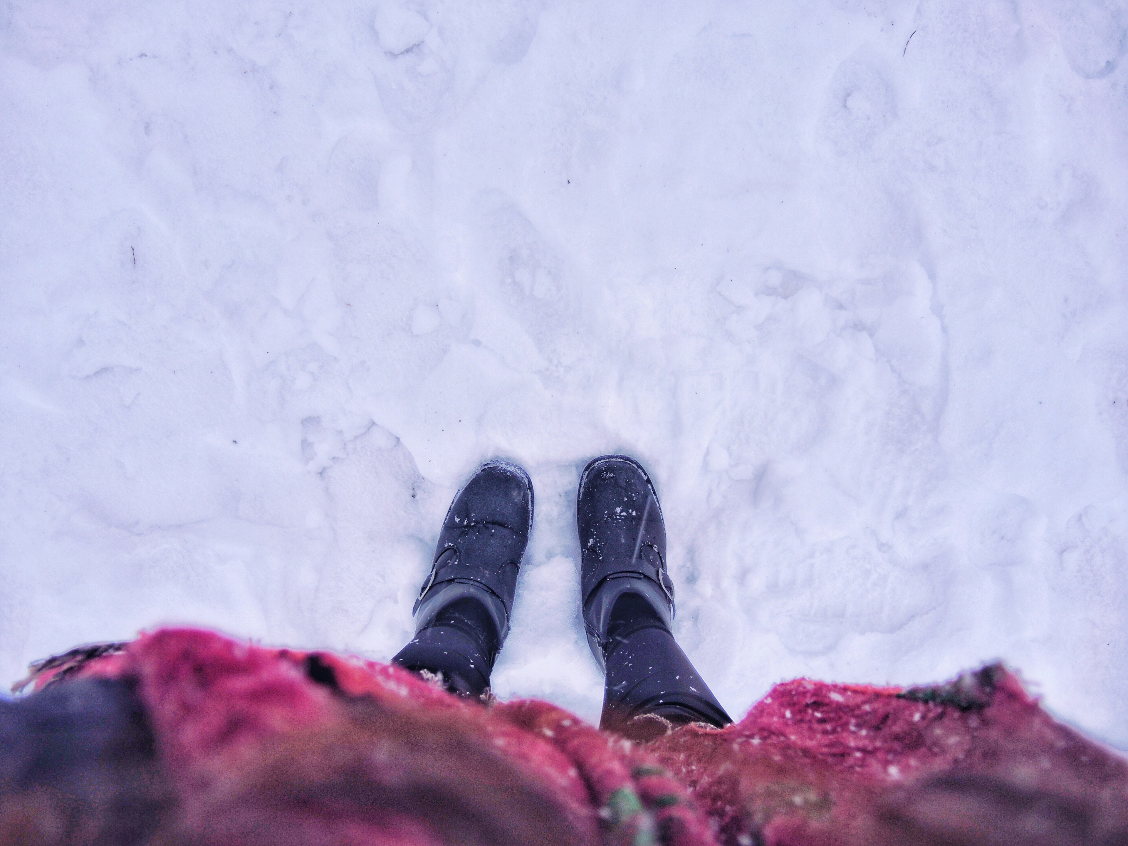 Slip on a good pair of hiking boots to tramp through snow and mud for your winter walking. Leah Lee/Shutterstock