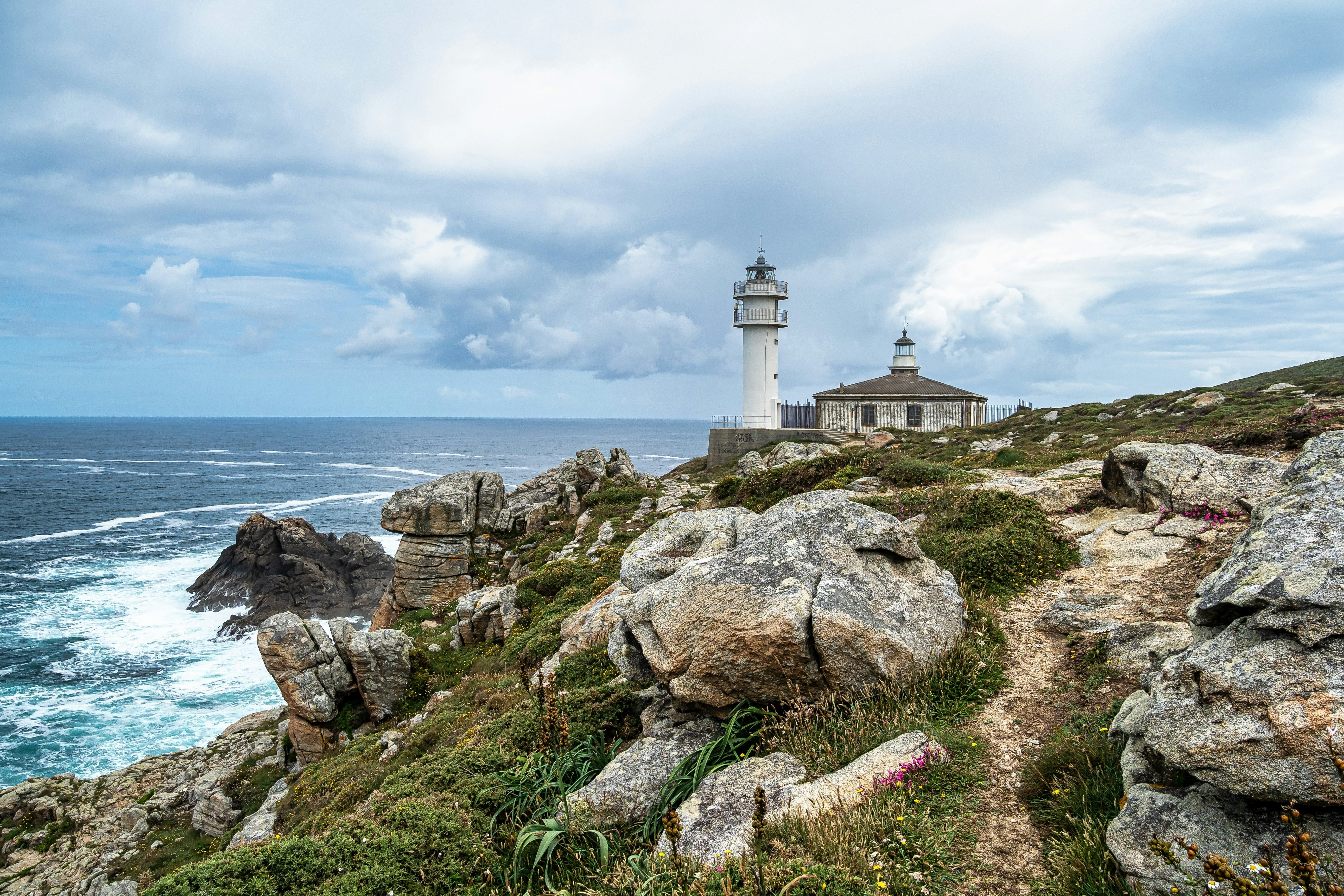 Lighthouse of cape of Tourinan in Muxia, Costa da Morte, Death Coast, Galicia, Spain.