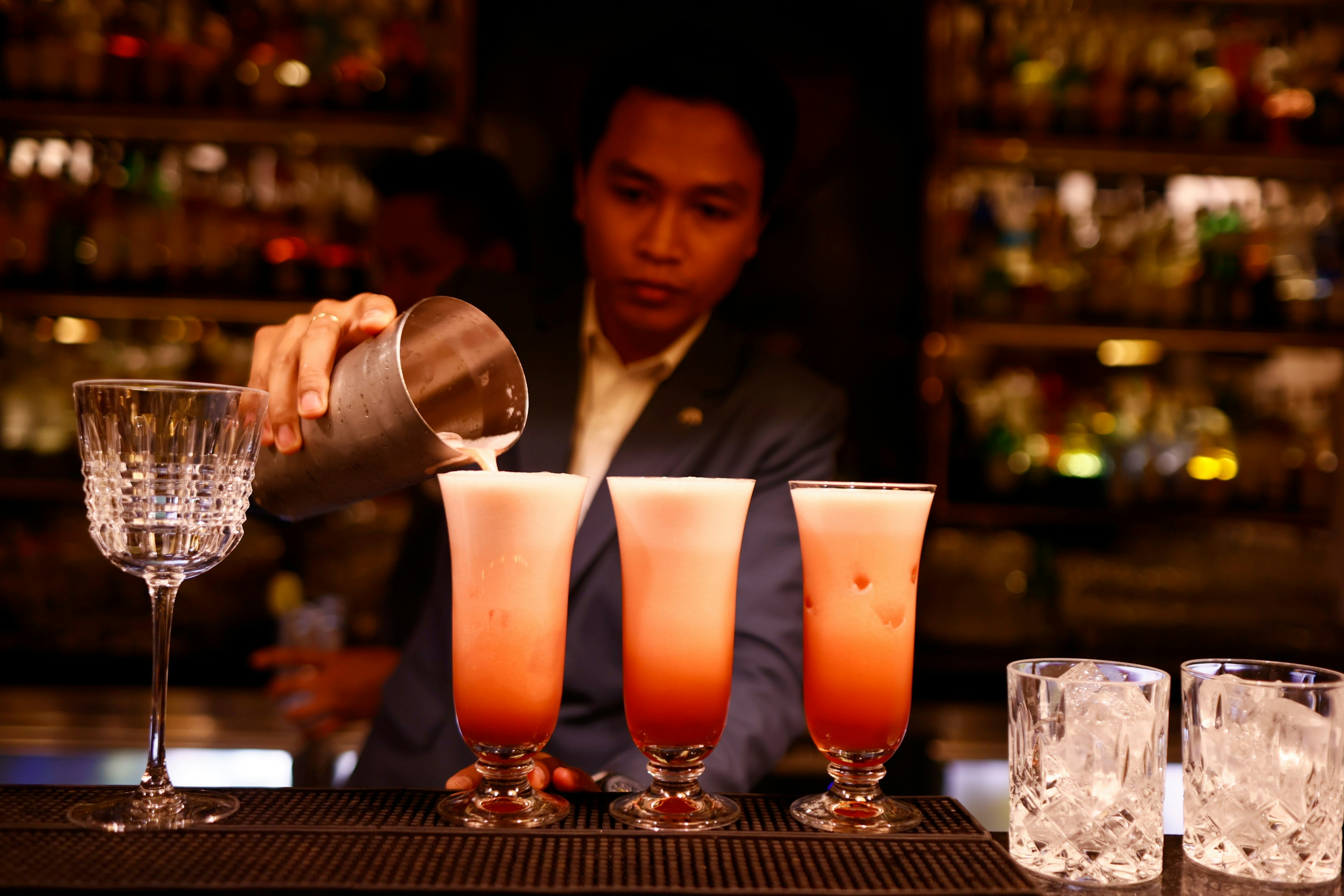 Elephant Bar at the Raffles Hotel Le Royal. The famous Singapore sling cocktail.  Phnom Penh. Cambodia.