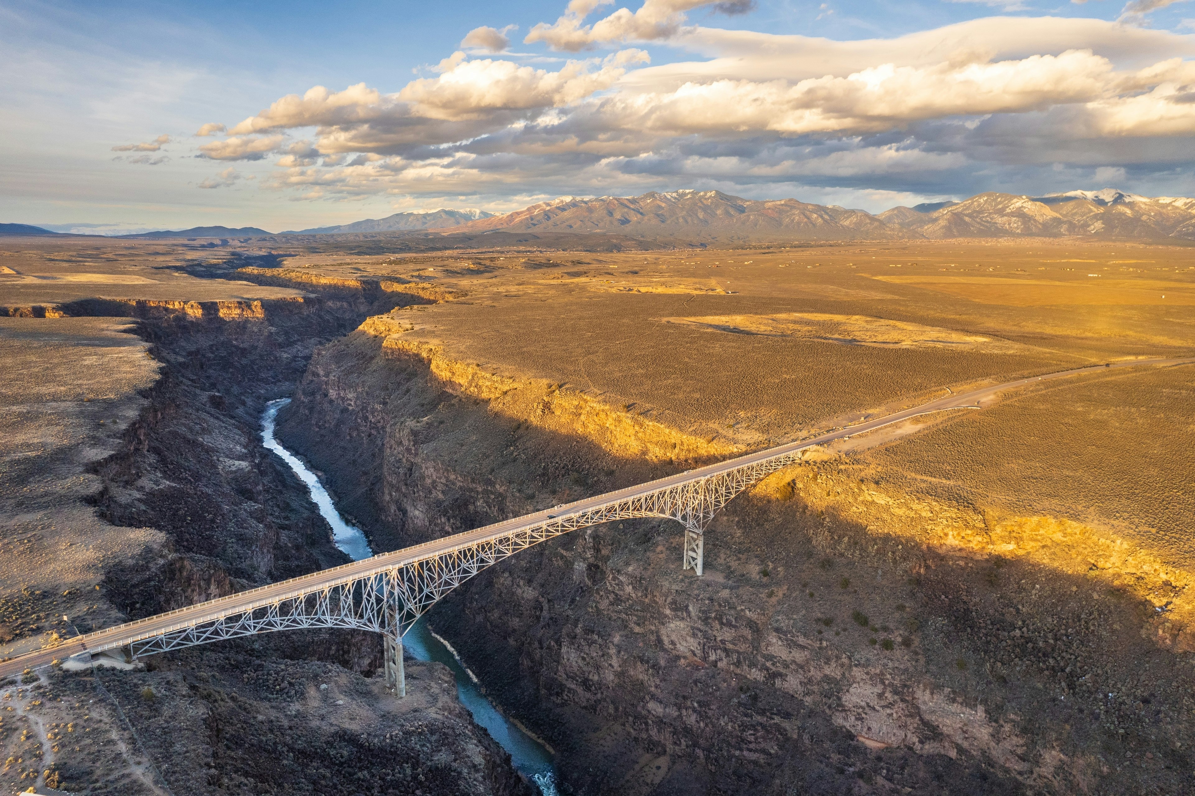 An aerial view of the Rio Grande River Gorge Bridge, which spans this dramatically deep gorge near Taos, New Mexico