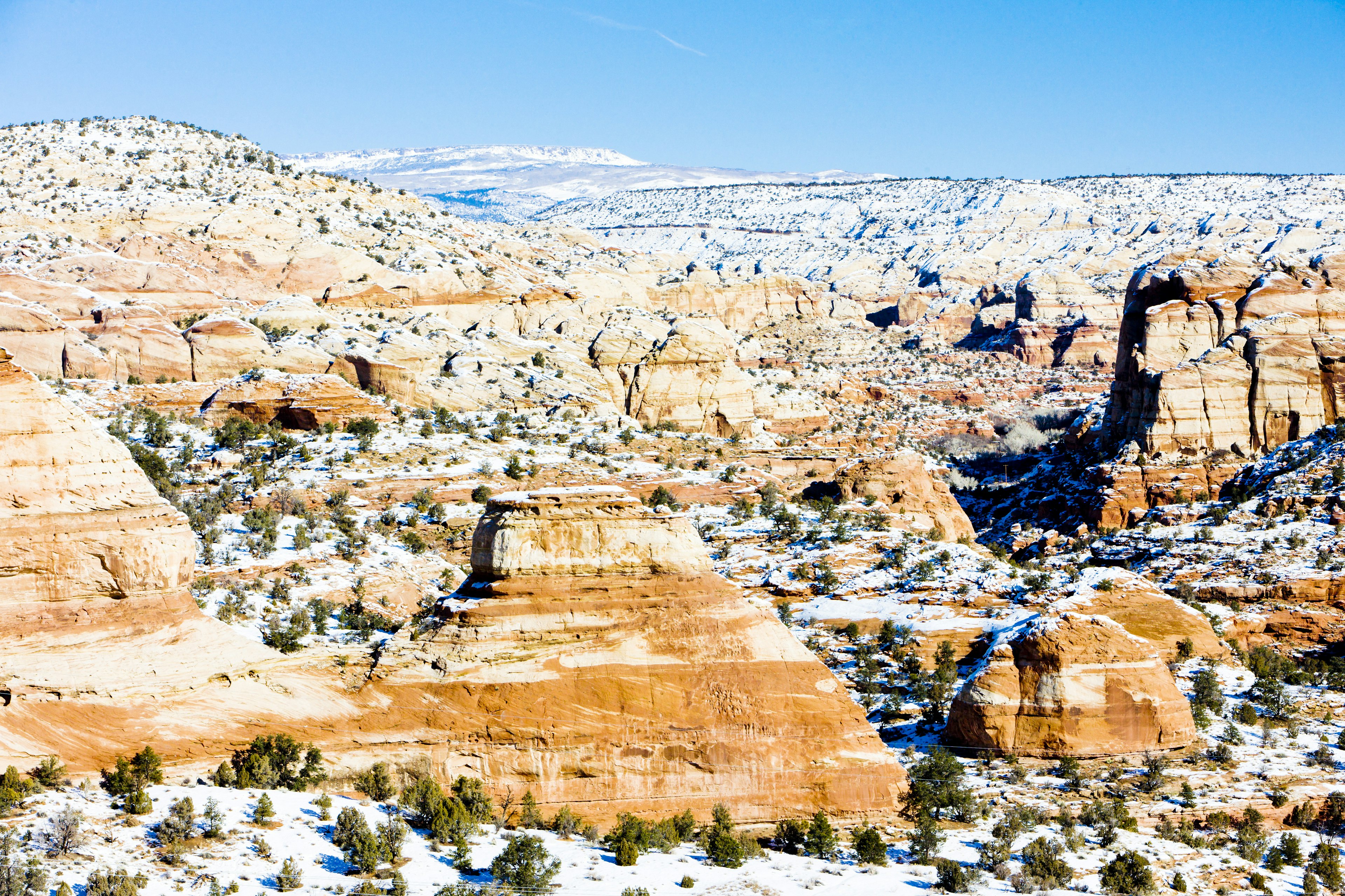 Admire how snow changes this rocky landscape. Richard Semik/Shutterstock