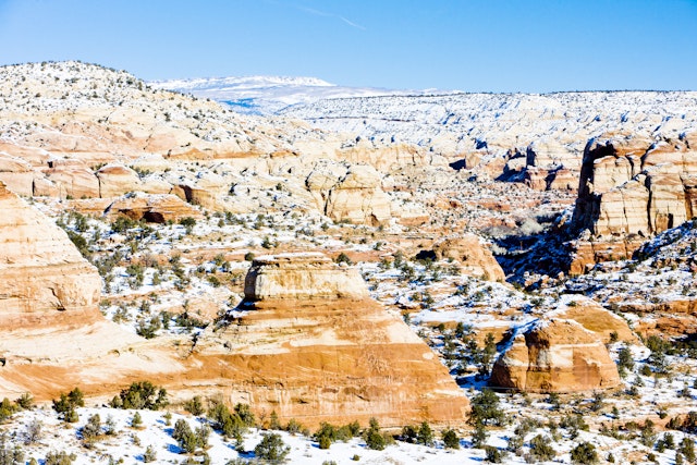Admire how snow changes this rocky landscape. Richard Semik/Shutterstock