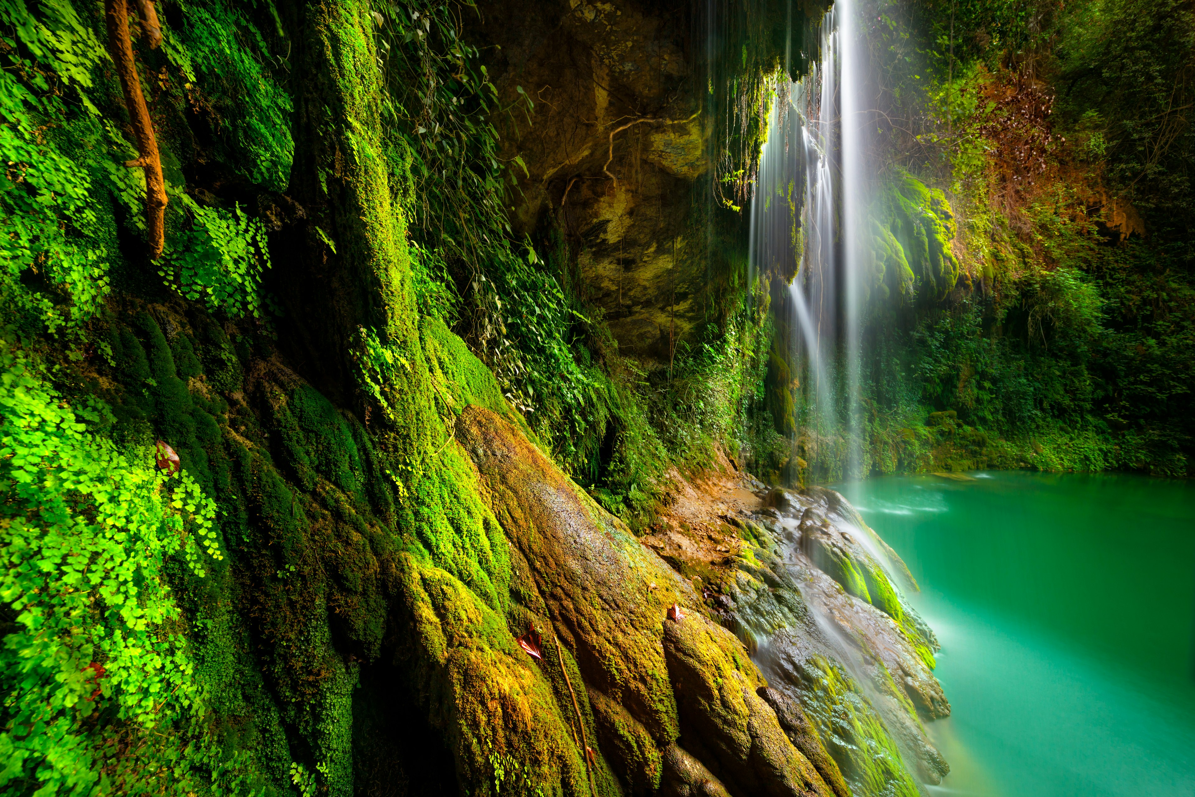 Amazing waterfalls among beautiful fresh greenery