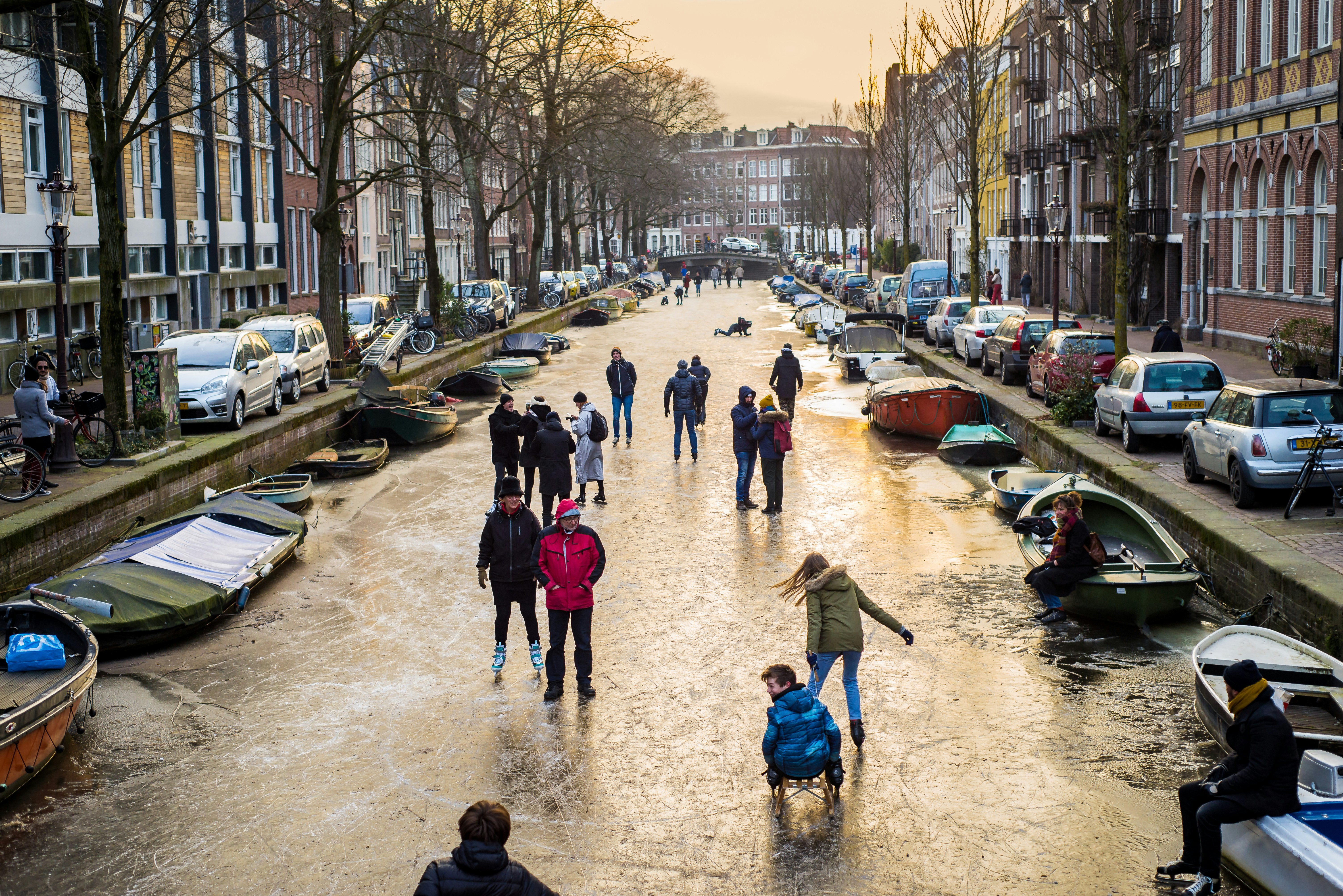 March 3, 2018: For the first time in 7 years, a deep freeze allows people to ice skate and walk on a frozen canal in central Amsterdam.
1038008869
adventure, amazing, amsterdam, architecture, bicycle, bike, boat, canal, capital, city, cold, culture, dutch, europe, european, famous, freeze, happy, healthy, history, holland, ice, landmark, lifestyle, many, netherlands, north, old, outdoor, outside, people, play, run, skate, small, snow, stereotype, stereotypical, street, sunset, tourism, tourist, town, traditional, transportation, travel, unique, urban, walk, winter