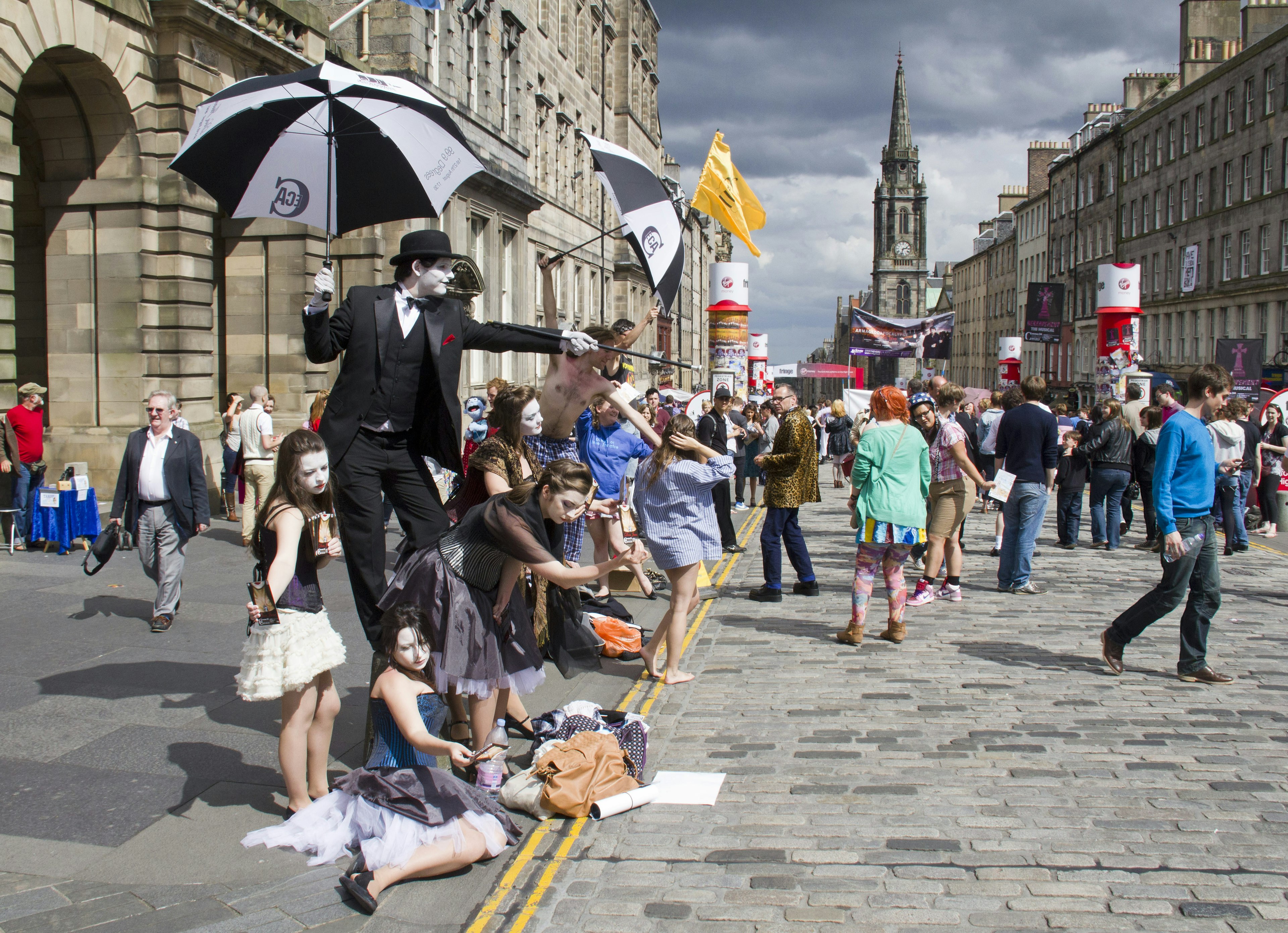 Cast of Don Juan by Jackinabox Productions perform on the Royal Mile, the main street of Edinburgh, at the Edinburgh Festival Fringe