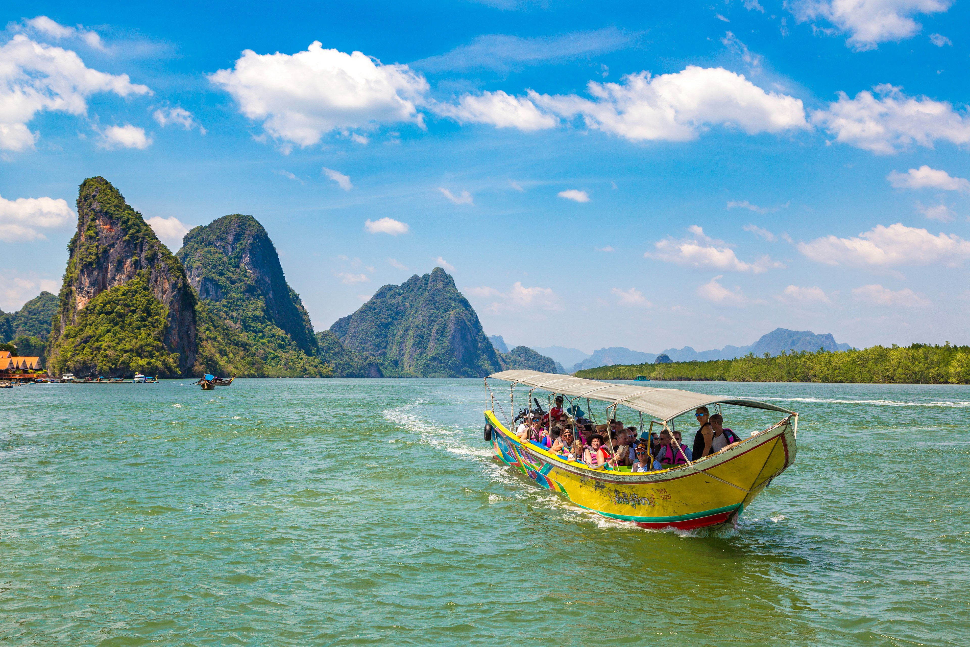 From downtown markets to the karst landscapes of Ao Phang Nga National Park, Phuket is a sampling platter of Thai experiences. Sergii Figurnyi/Shutterstock