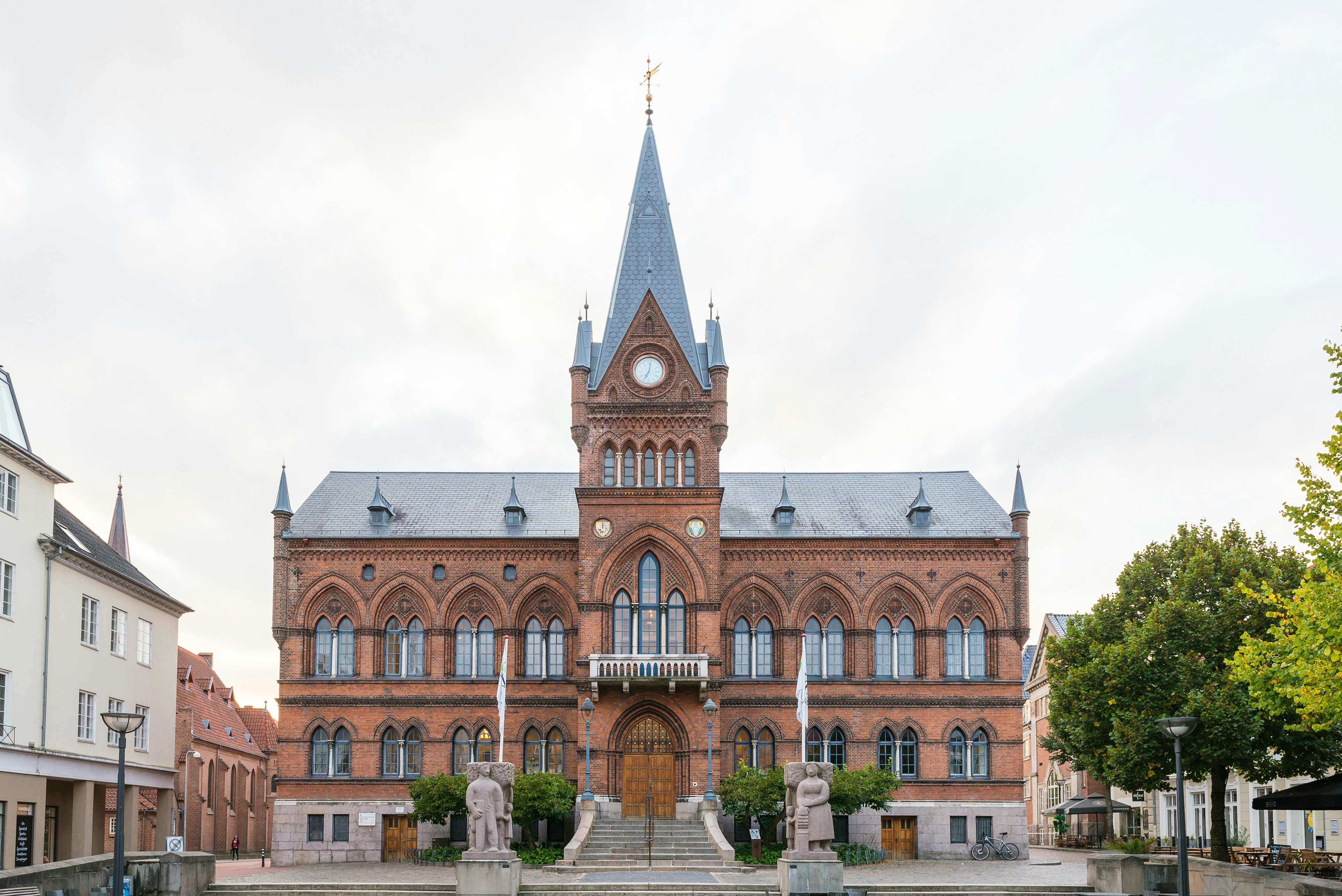 The Gothic-style Town Hall in Vejle, Denmark on an overcast day.