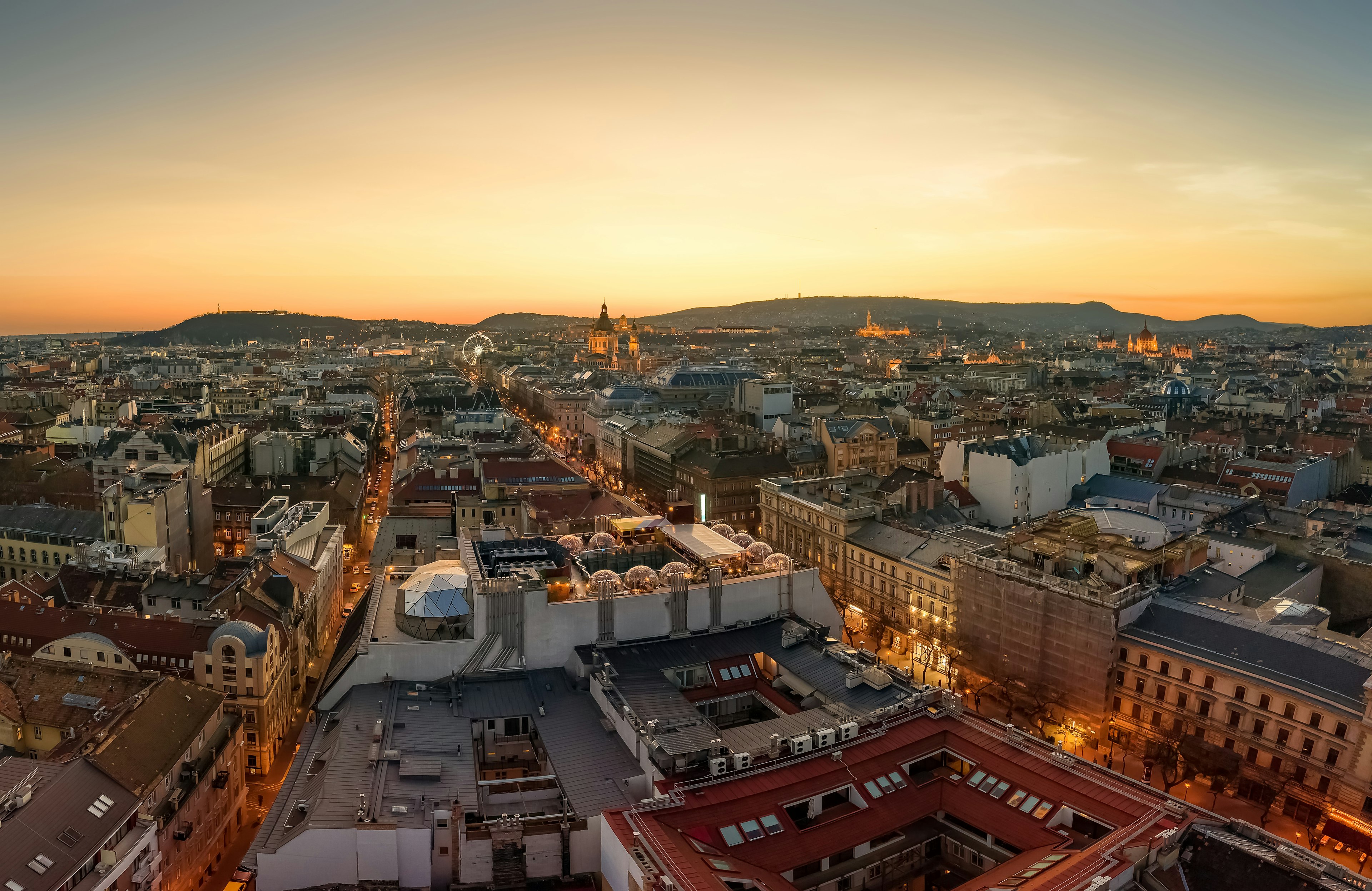 Sunsets behind a cathedral in Budapest.