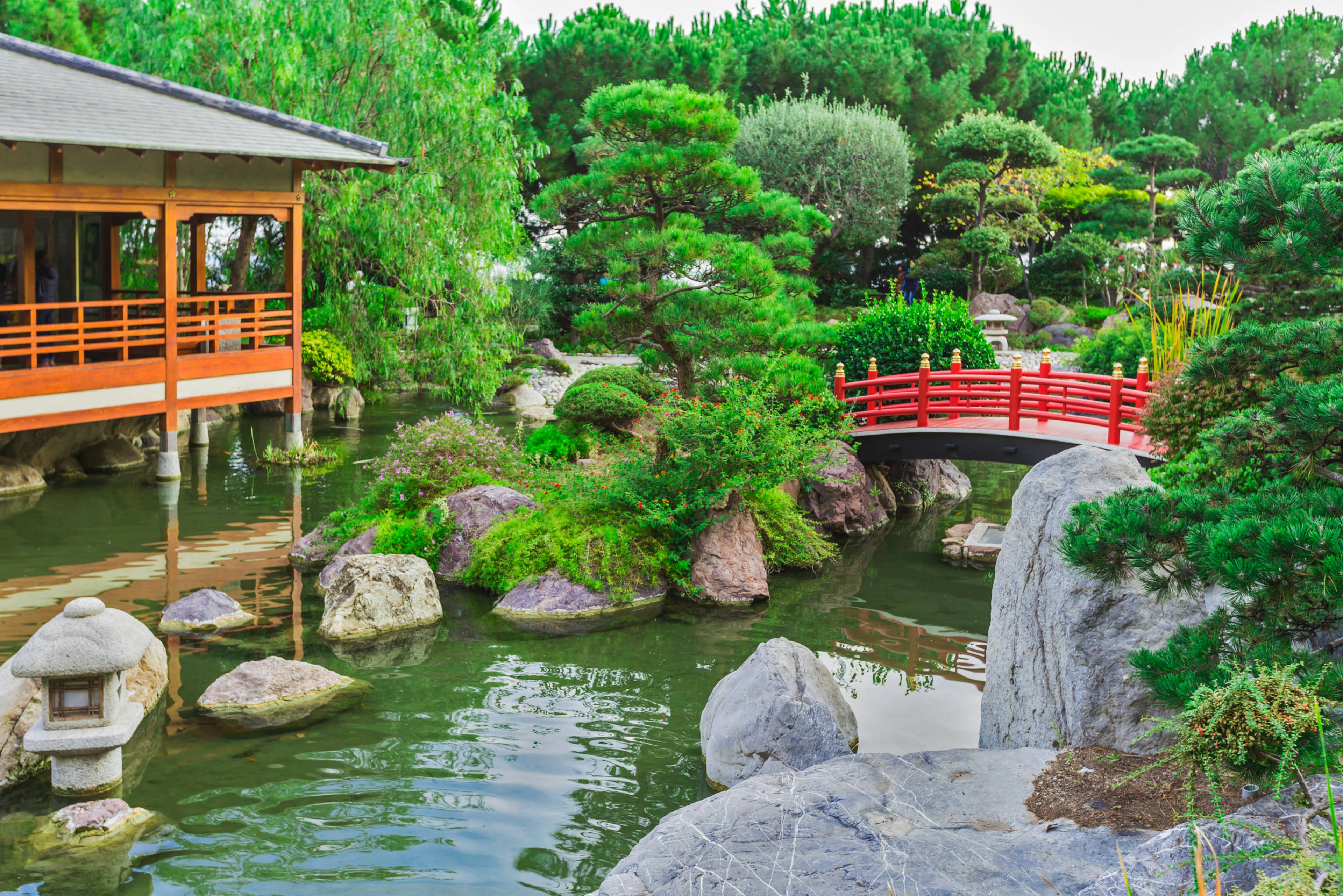 The Japanese Garden in Monaco with a Shinto tea house and red arched bridge