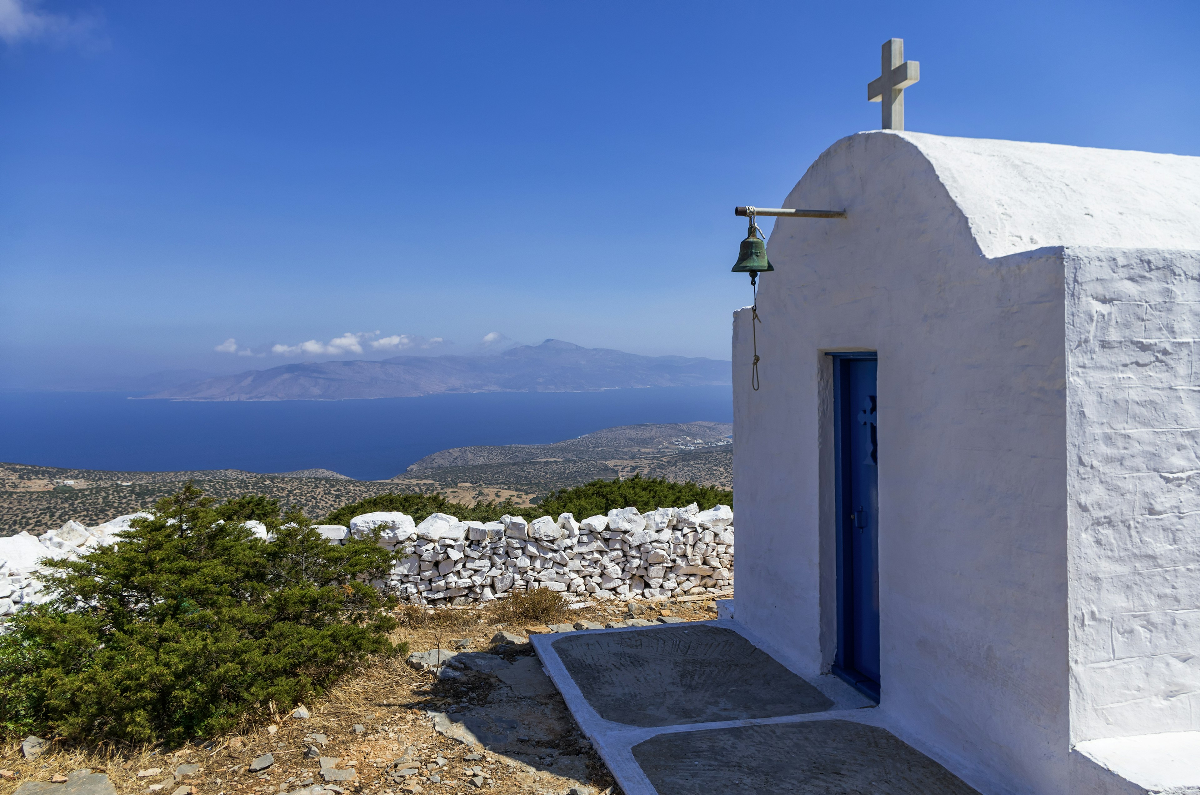 Solitary chapel on a hilltop overlooking Iraklia island