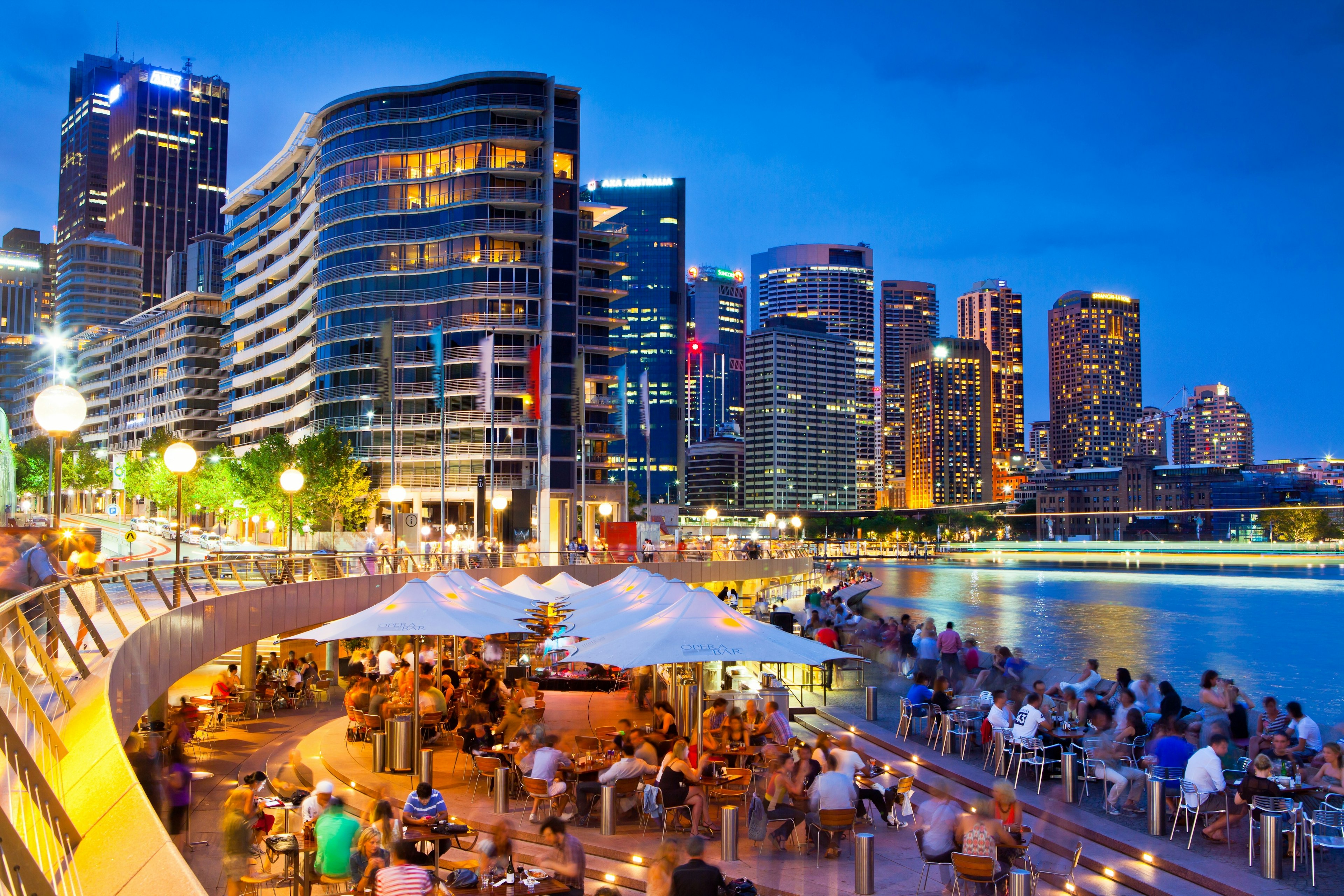 Long-exposure of people at the Opera Bar in Circular quay at dusk.