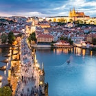 Panorama of Prague with red roofs from above on a summer day at dusk, Czech Republic