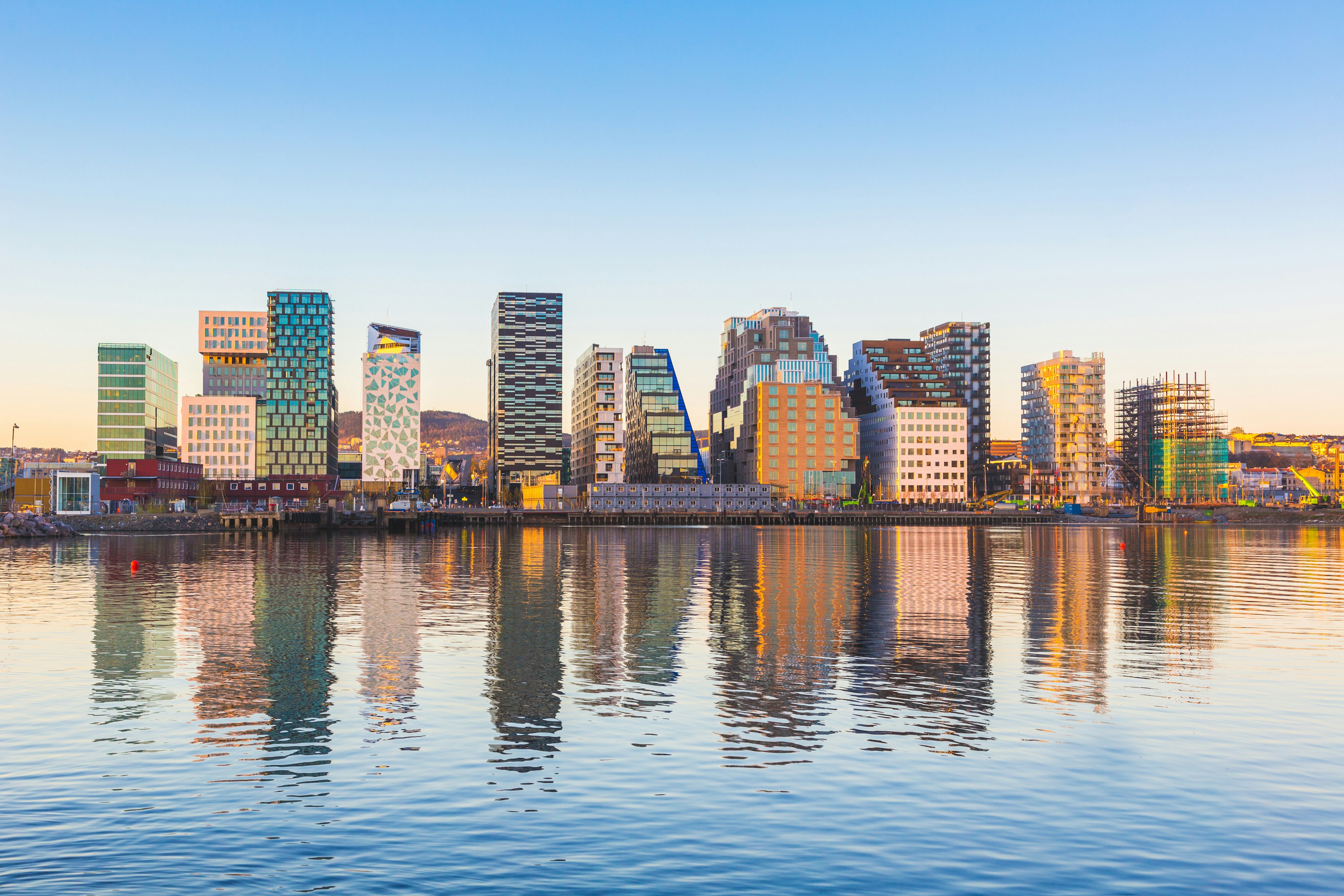 Modern buildings in Oslo, Norway, with their reflection into the water