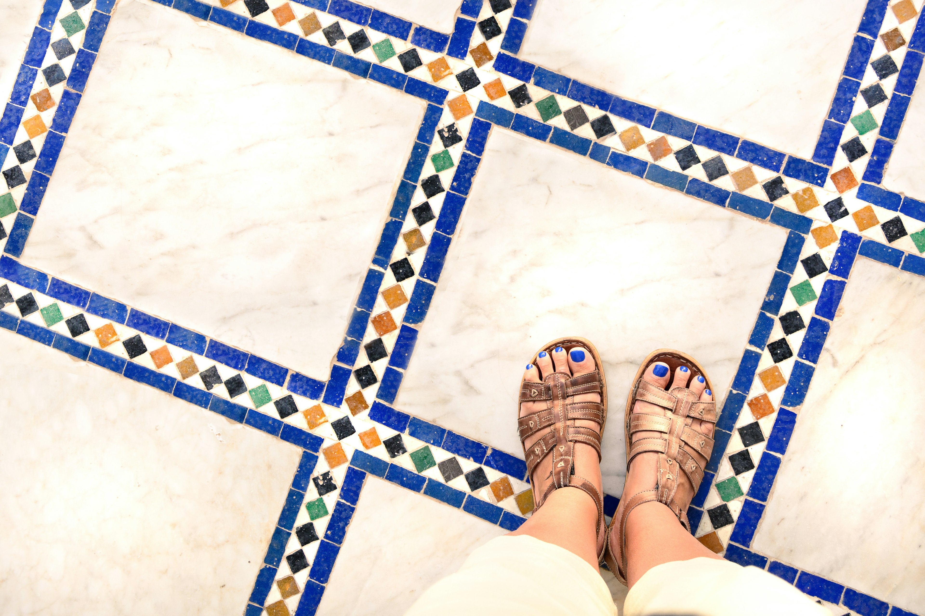 Sandals on North African tiles.