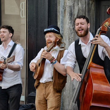 Buskers performing music on the streets of Galway