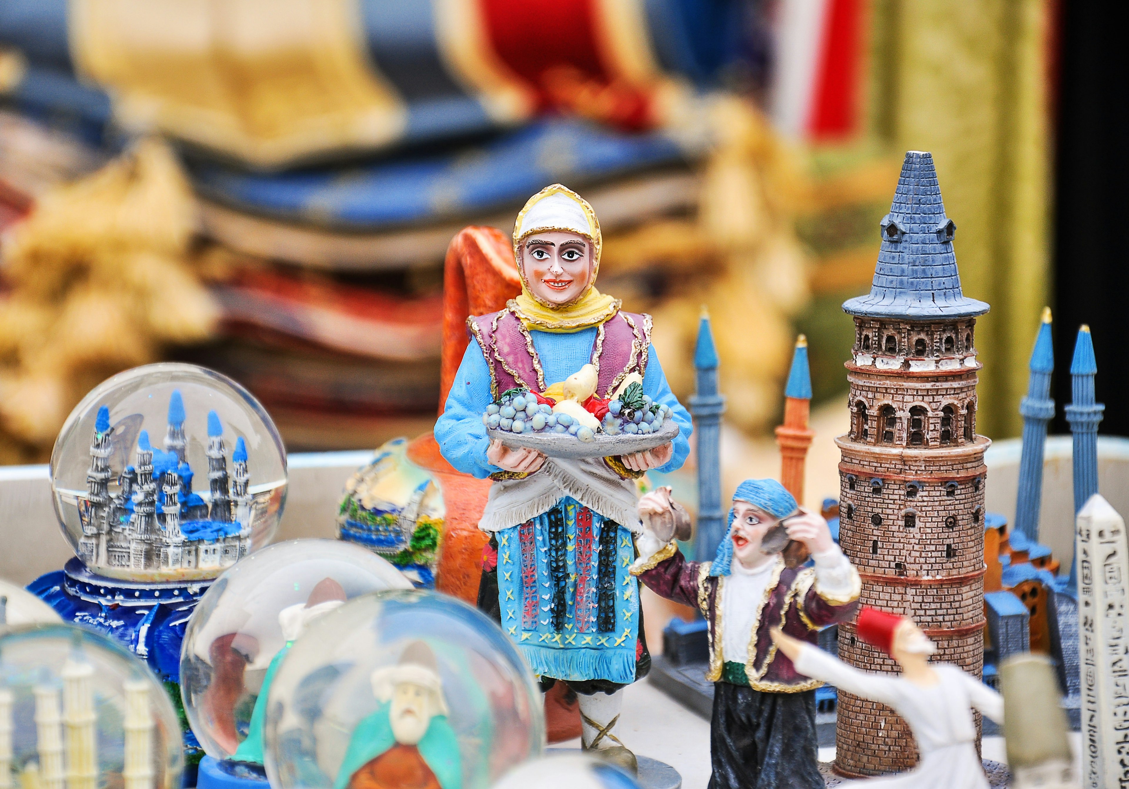 A collection of small figurines on display at a store in Istanbul