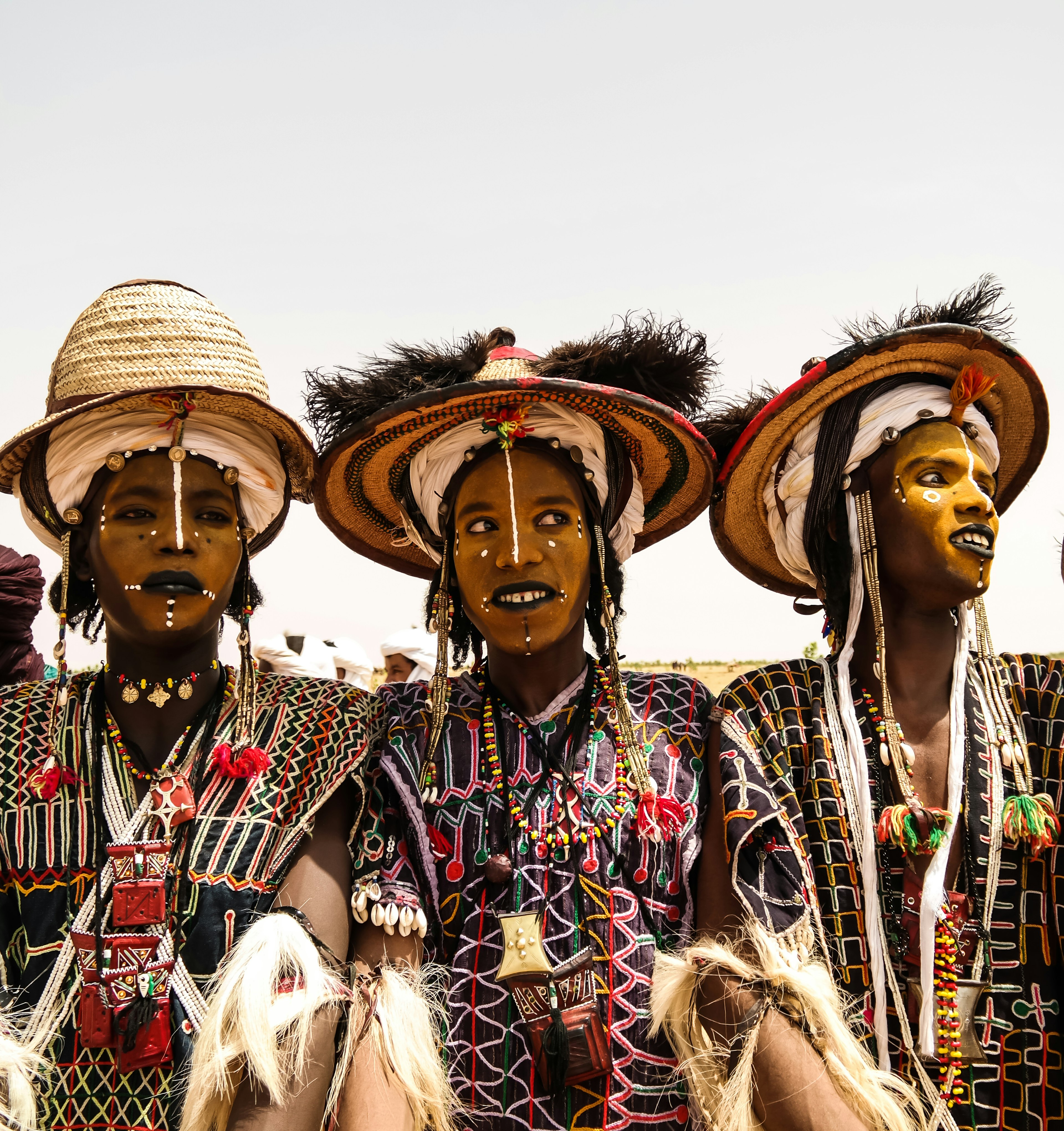 People in costumes and makeup performing at the Gerewol Festival in Niger.