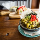 Selection of vegan sushi on a table at Momo in Montréal, Canada