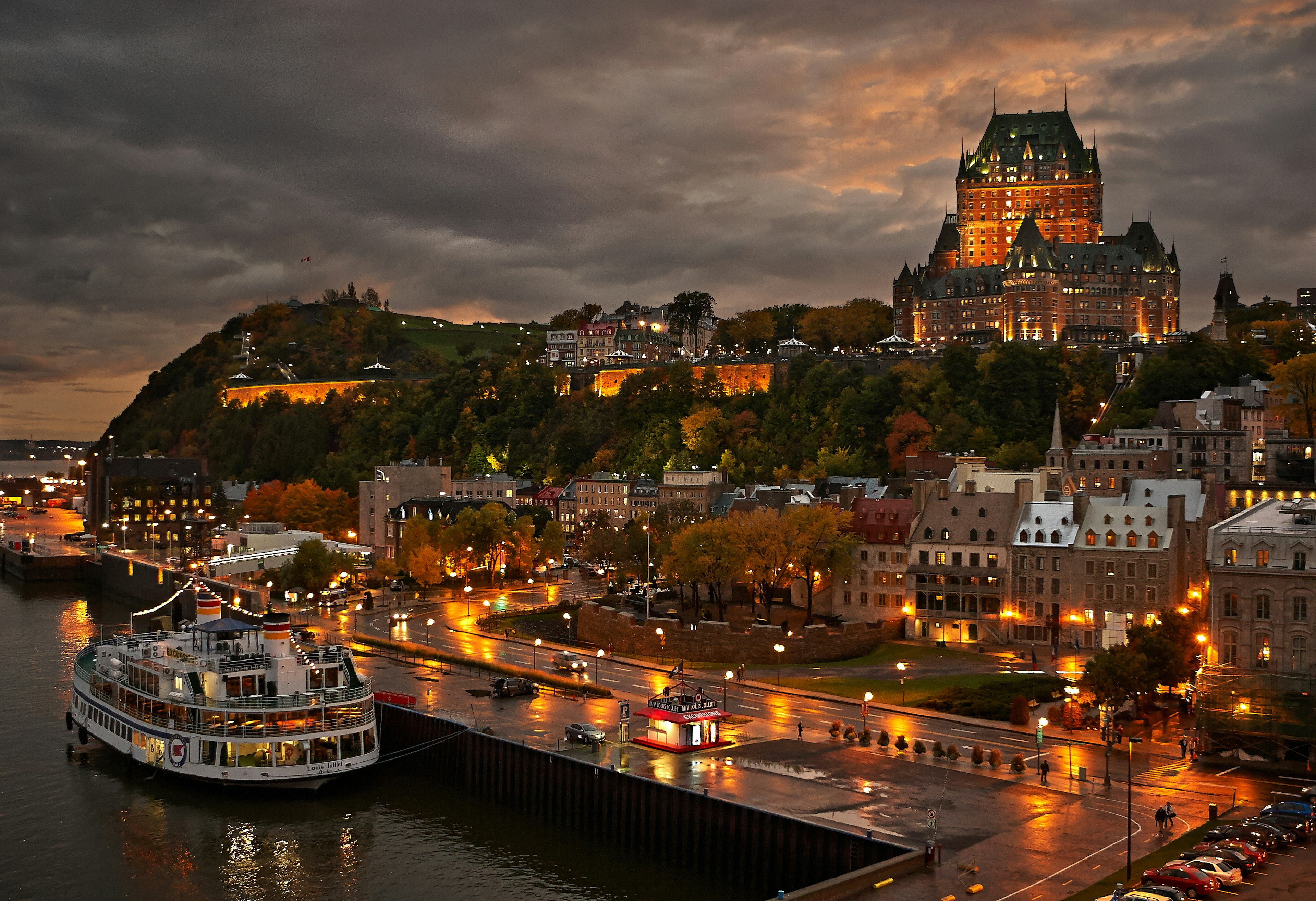 Quebec City after the rain at dusk with view of Le Chateau Frontenac on top of the hill.