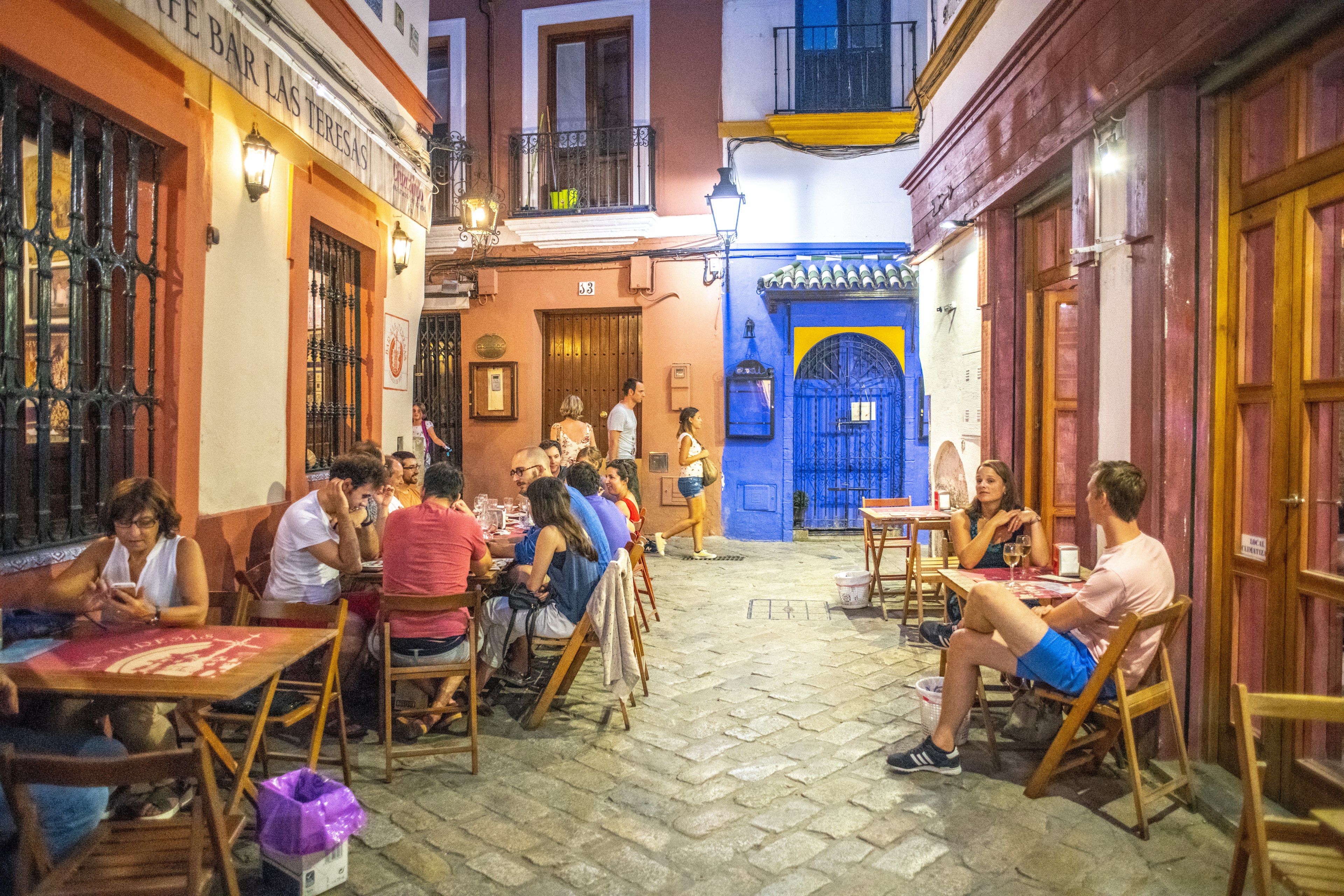 People eating at outdoor terraces in Seville