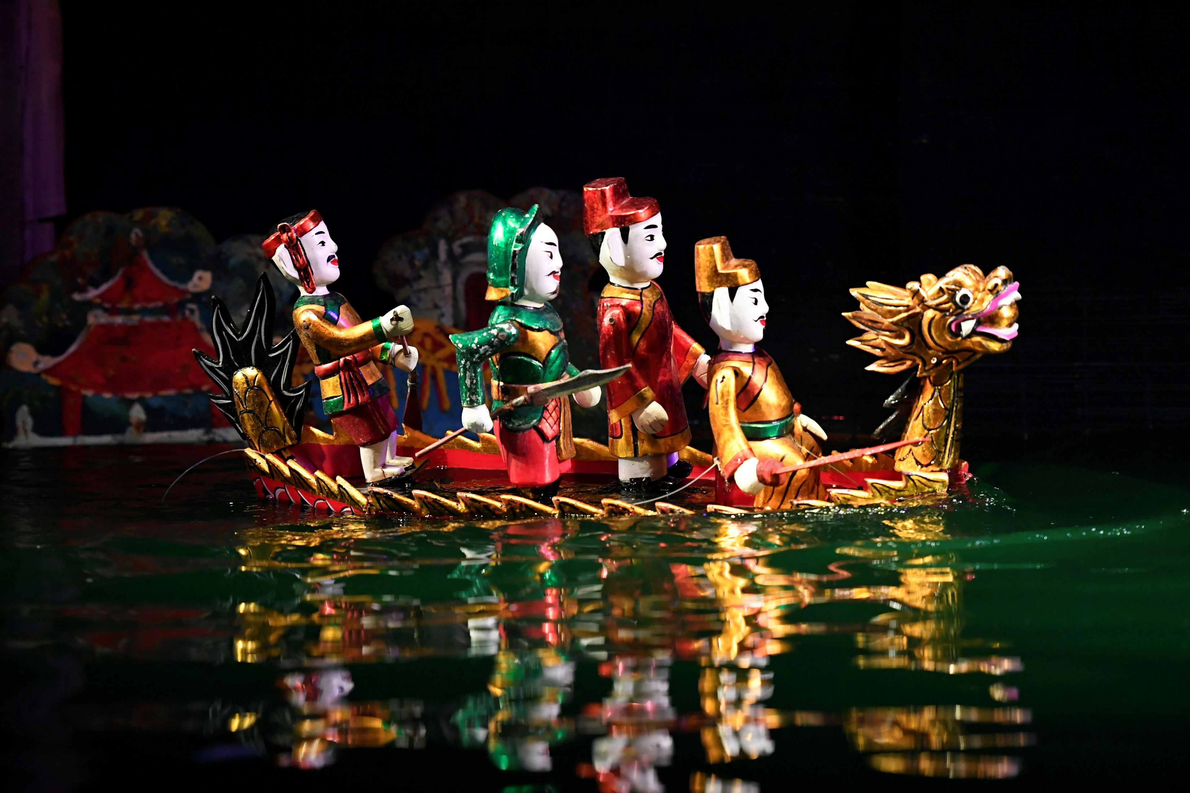 Colorful water puppets in a performace at the Thang Long theatre in Hanoi, Vietnam