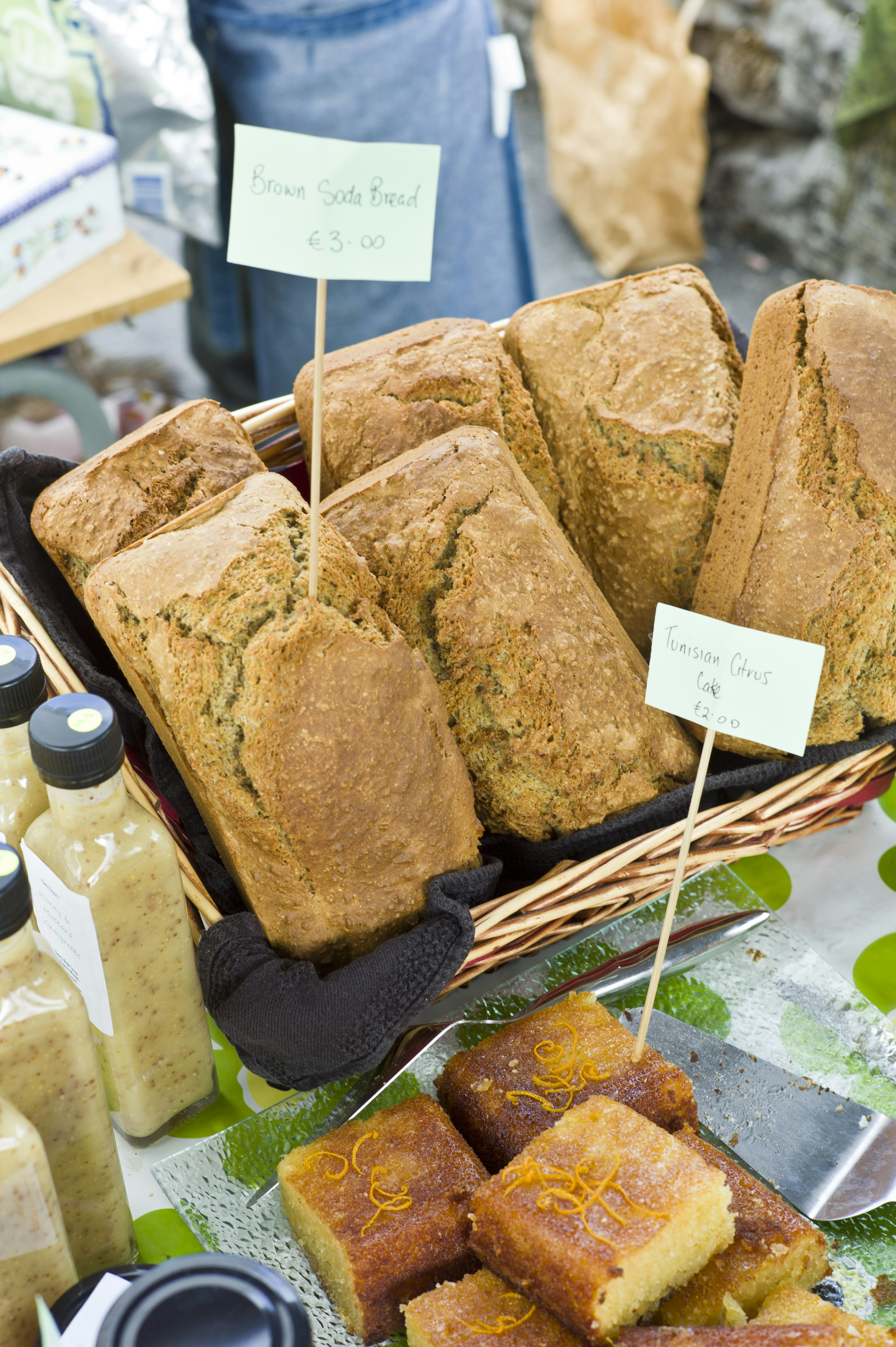 Home-baked cakes, traditional soda bread and homemade salad dressing on sale at farmer's market