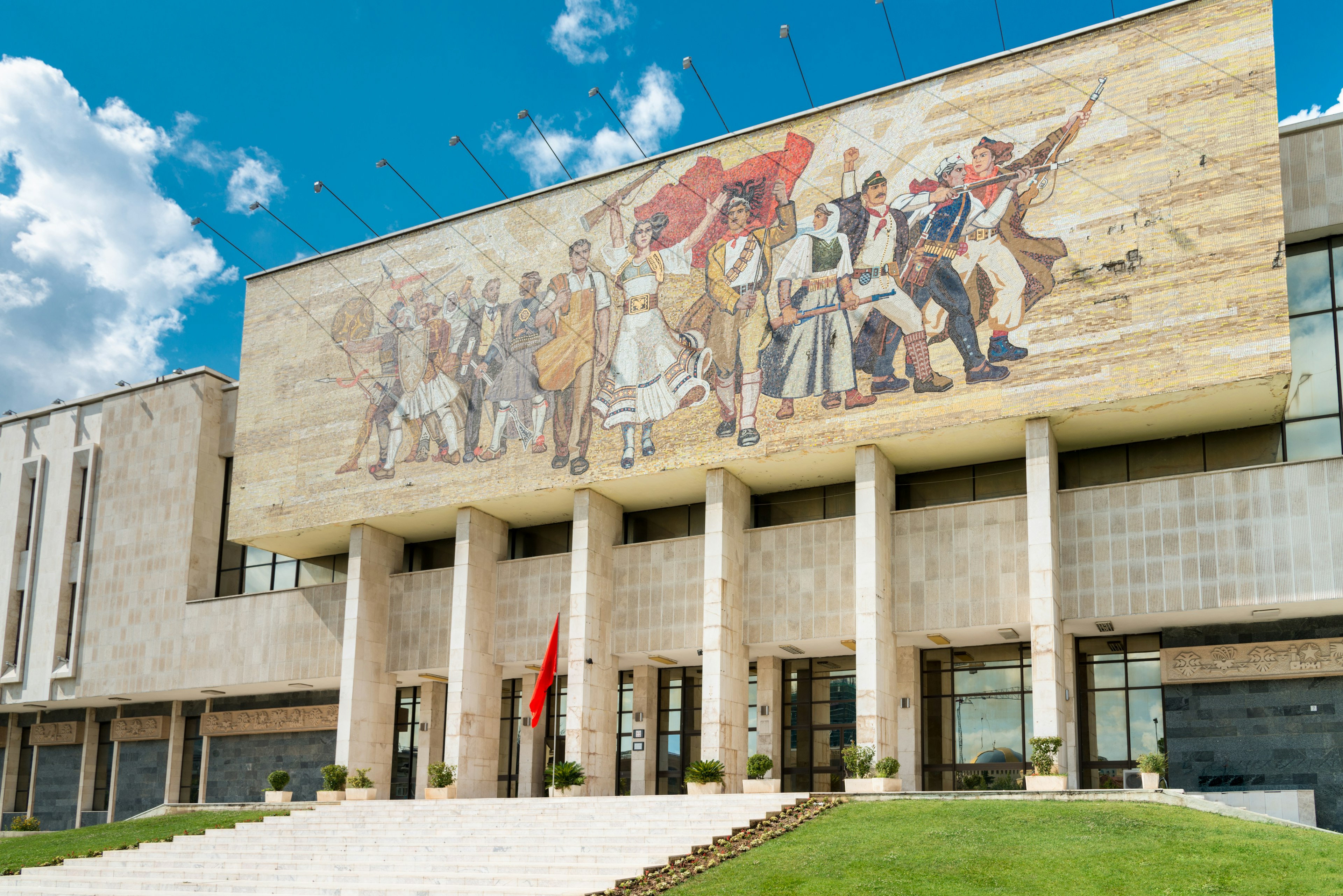 The National History Museum facade features a mosaic depicting revolutionary figures.