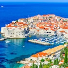 598163608
Water; Church; Travel Destinations; Town; Tower; Balkans; Fortified Wall; Photography; Surrounding Wall; Seascape; Horizontal; History; Vacations; Harbor; No People; Social History; Scenics - Nature; Cultures; Old Town; 60595; Mediterranean Countries; Adriatic Sea; Sea; Outdoors; Coastline; Ragusa - Sicily; City; Beach; Cityscape; Bay of Water; Landscape; Europe; UNESCO World Heritage Site; Dalmatia Region - Croatia; Croatia; Dubrovnik; Medieval;
Dubrovnik, Croatia. Picturesque view on the old town (medieval Ragusa) and Dalmatian Coast of Adriatic Sea.