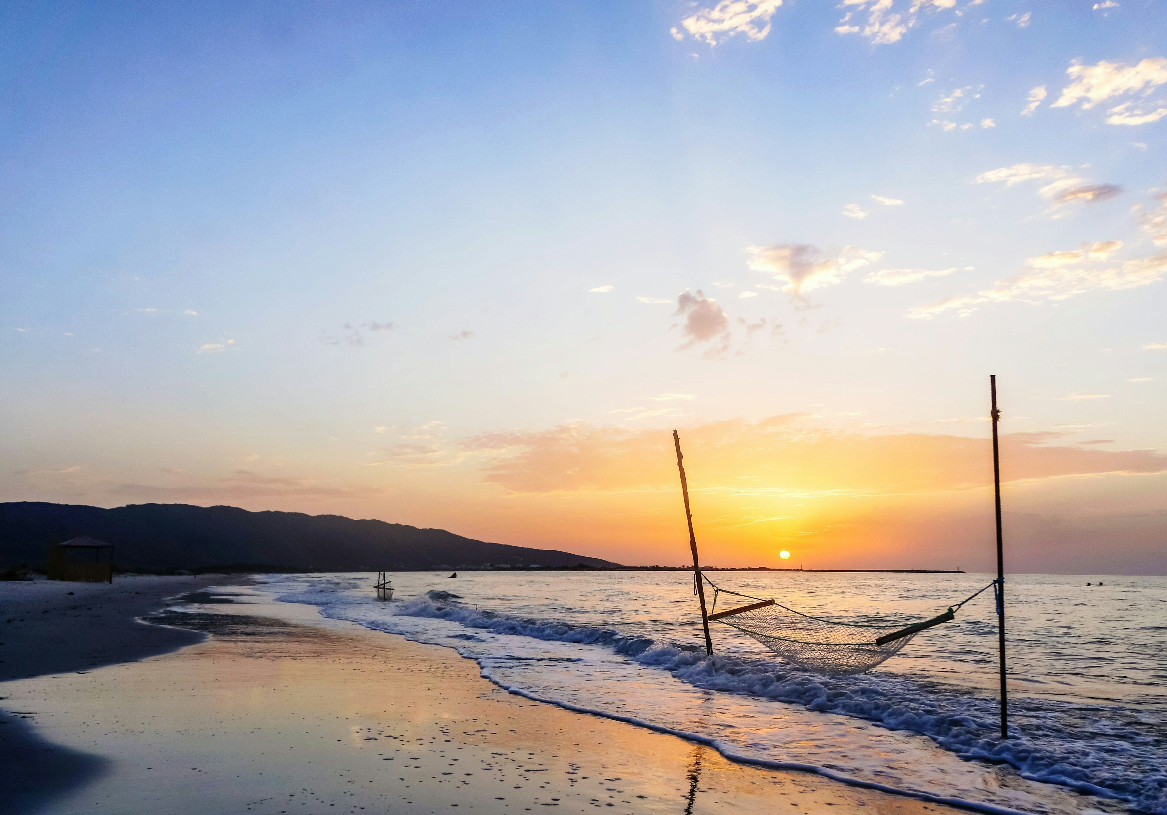 Hammock on the beach at sunset, Sousse, Tunisia