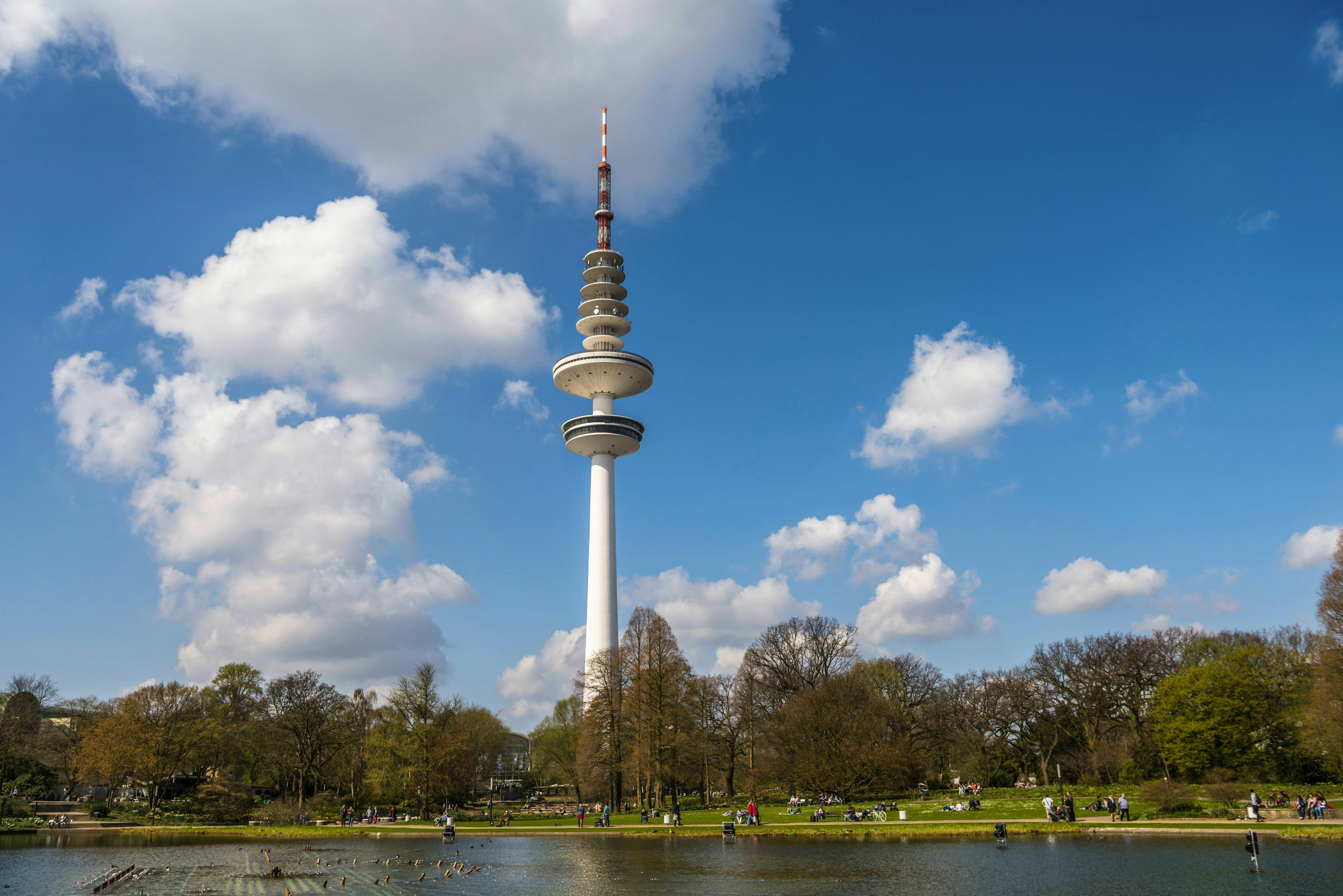 Lake Parksee at back the Hamburger television tower in Hamburg, Germany.